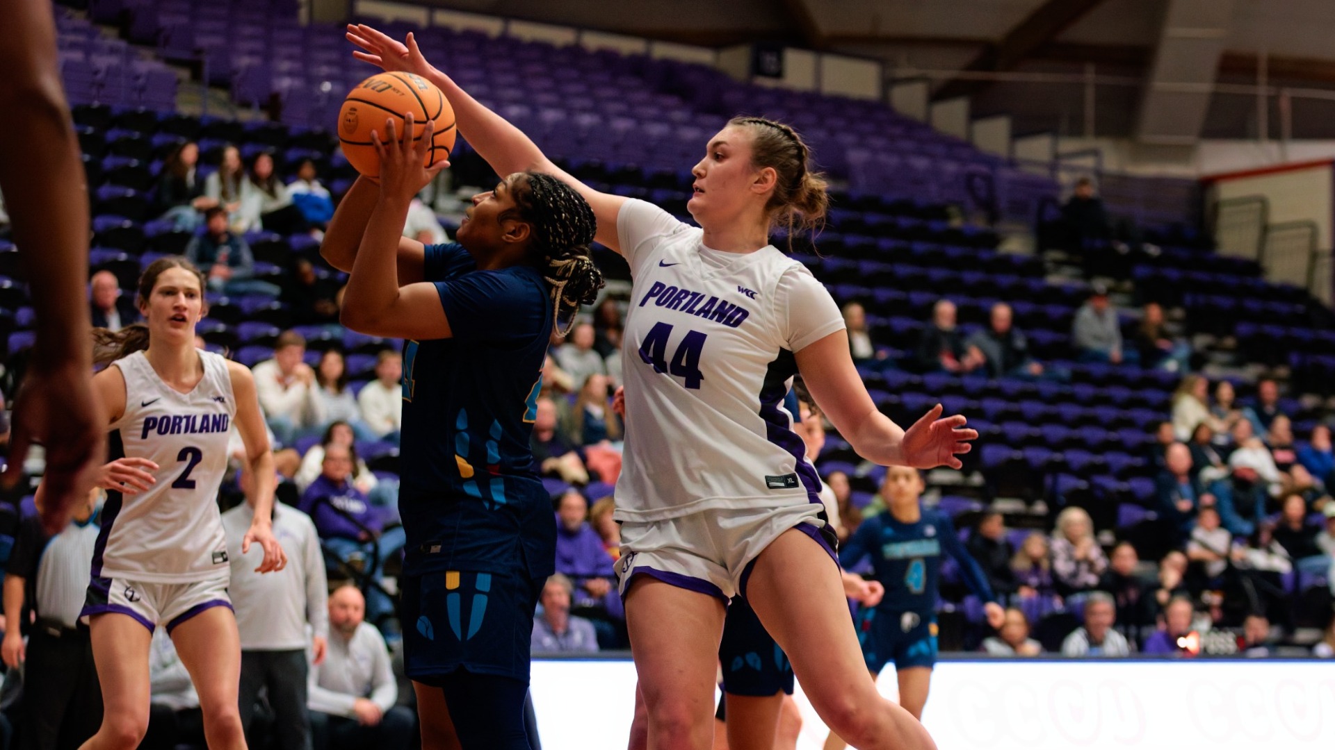 Julia Dalan blocks a Nevada player.