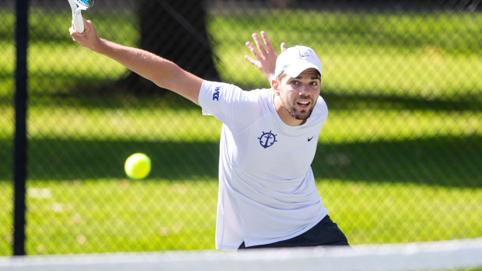 Nikola Keremedchiev hits a slice backhand in a match at Boise.
