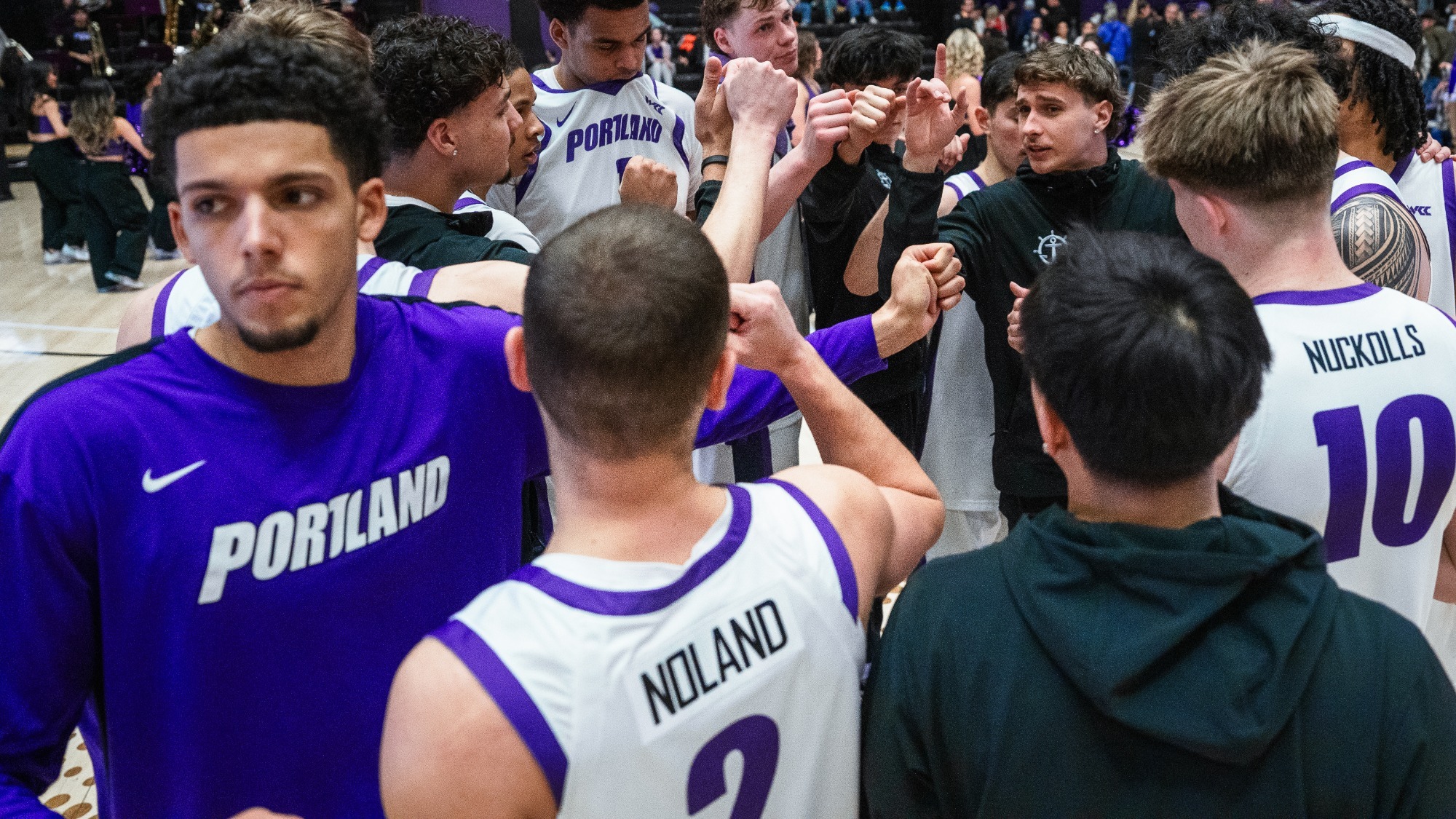 Portland huddles on the court during a game.