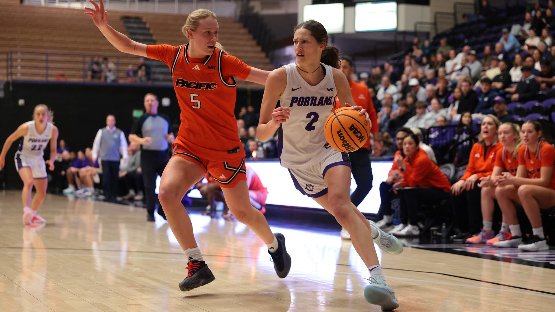 Dyani Ananiev drives to the hoop against Pacific.