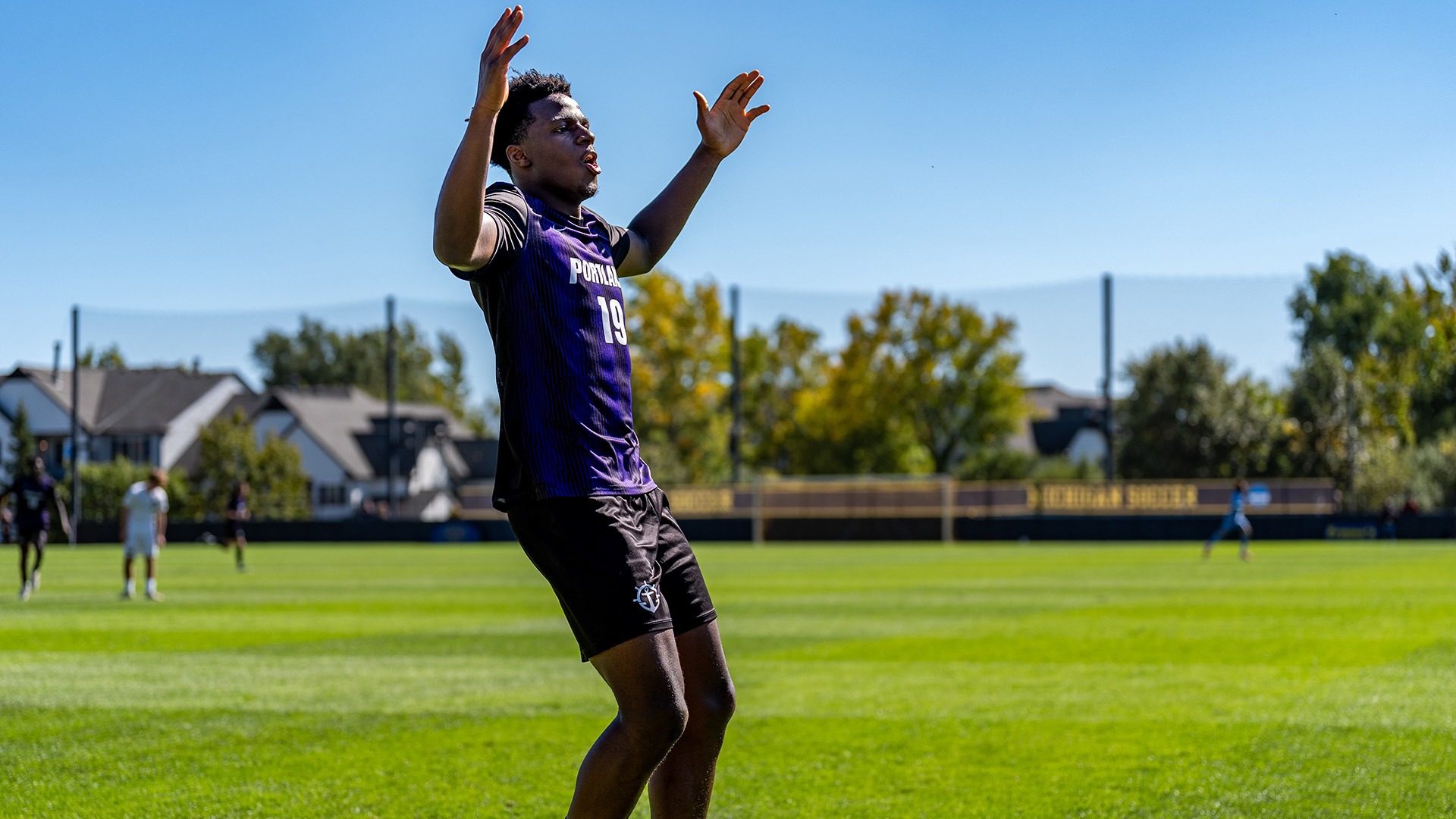 David Ajagbe celebrates his goal against Michigan.