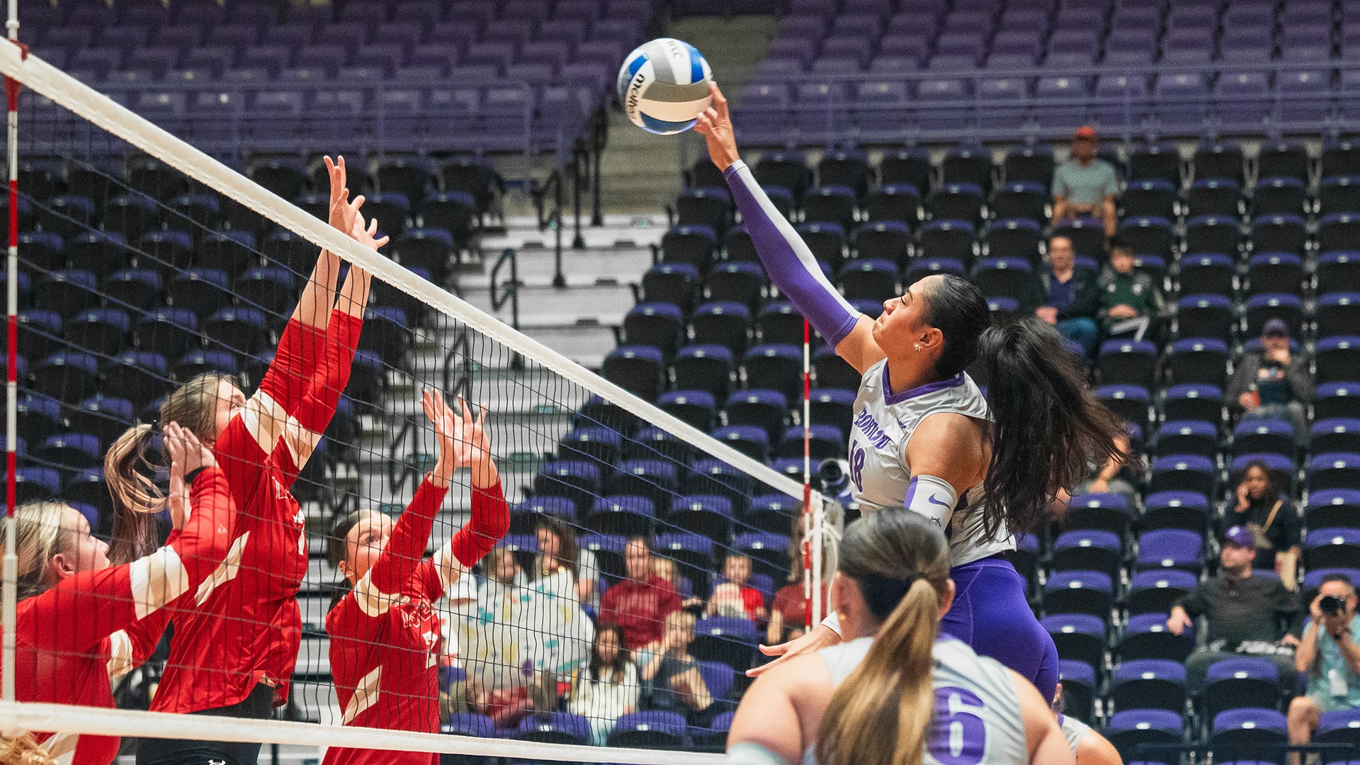 Taina Kauuwai goes for the kill against Denver.