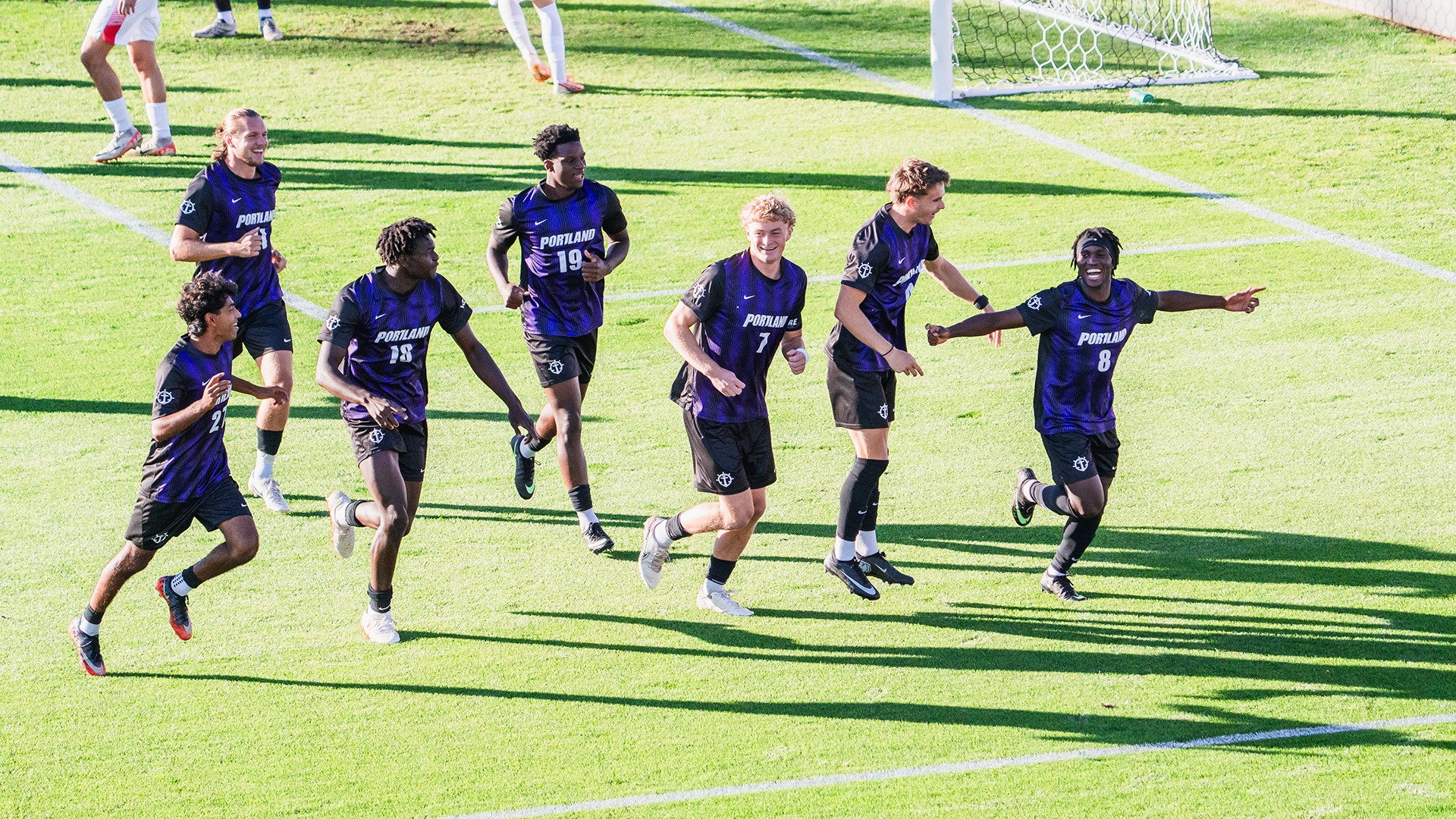 The Pilots celebrate Efe Aror's goal.