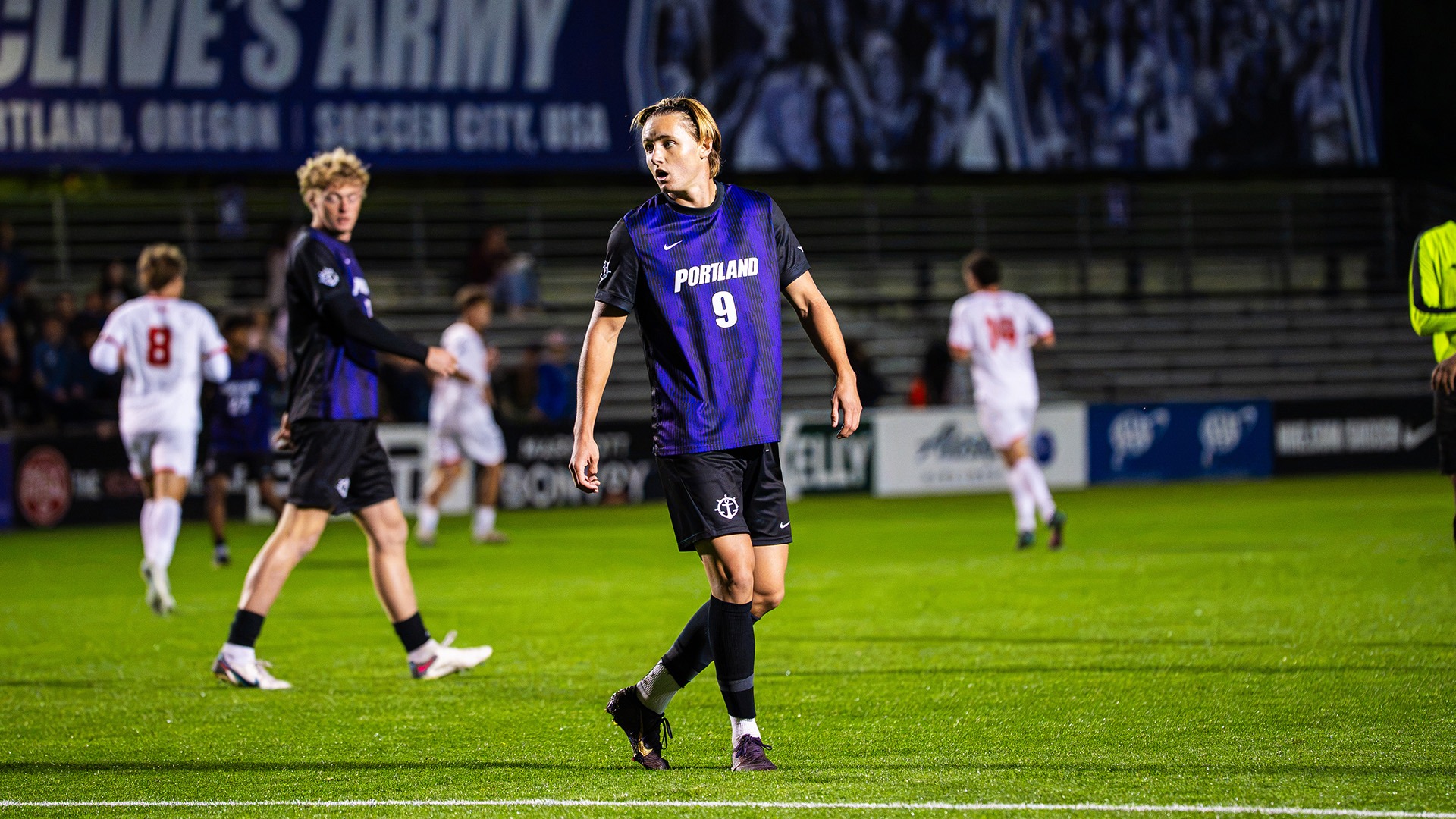 Alex Waggoner stands in the midfield against Denver.