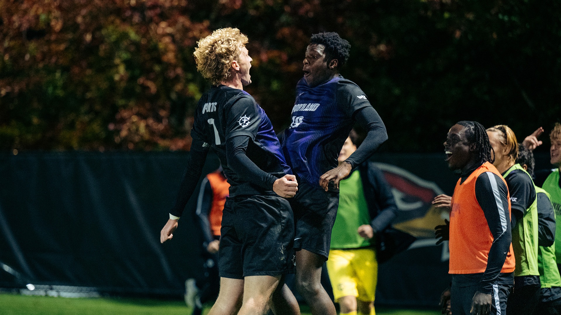 Joe Highfield and David Ajagbe celebrate Ajagbe's goal against Seattle U.