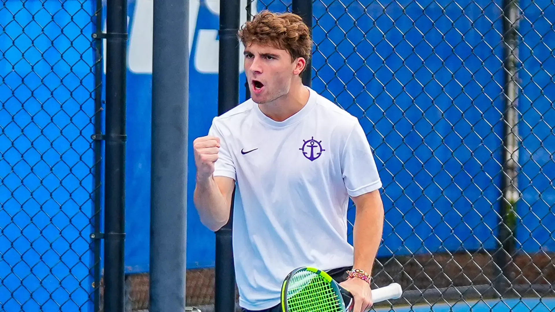 Tom Garcia celebrates a point during a Fall match