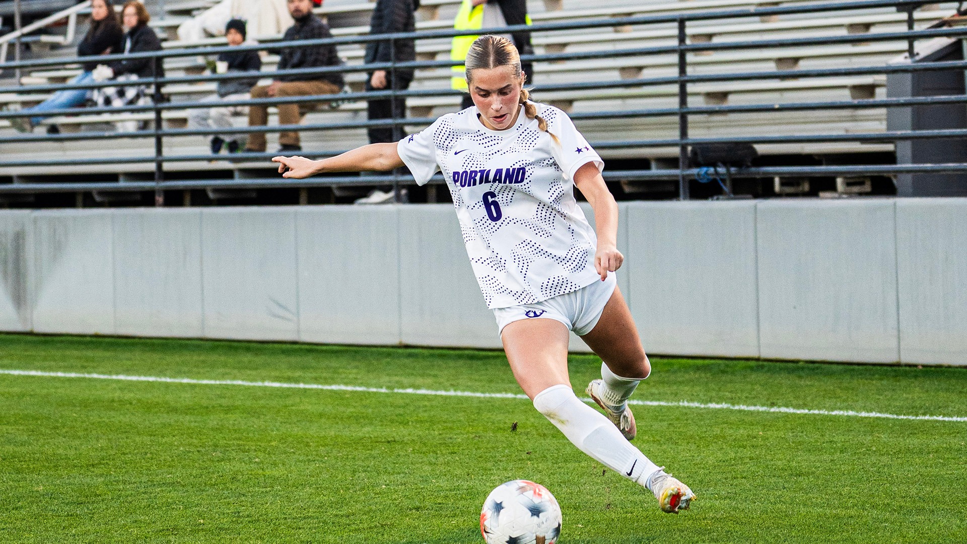 Cate Kovats sends a ball into the box.