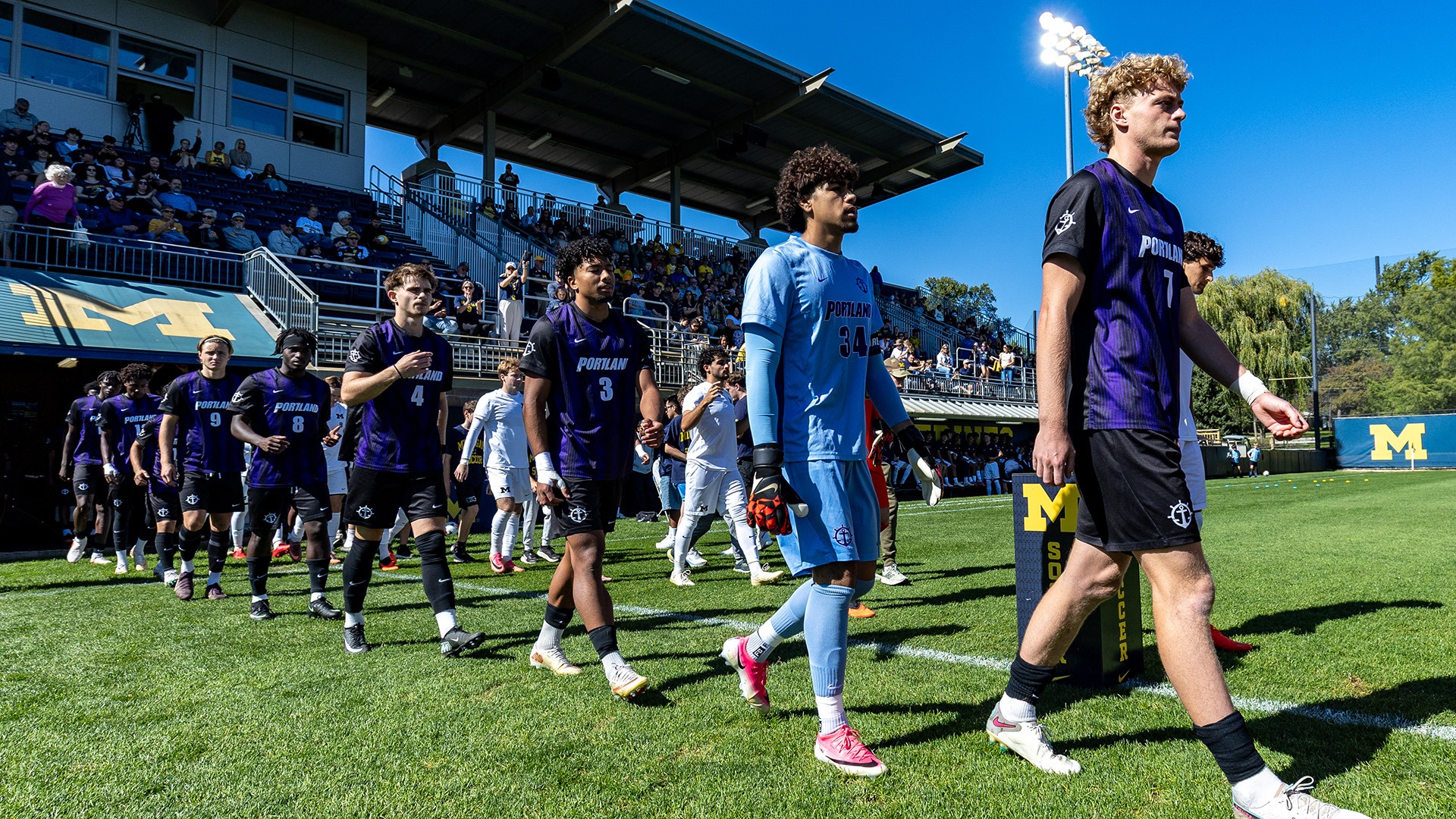 Men's Soccer walks onto the field for their matchup against the Michigan Wolverines.