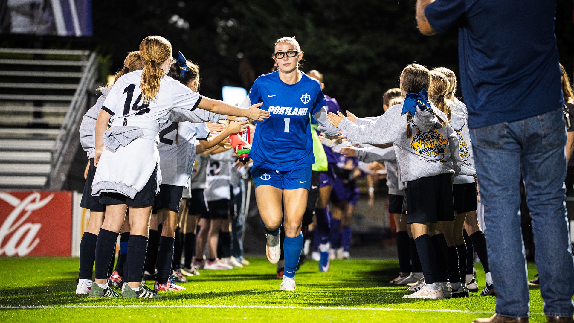 Sophia Hills runs onto the field ahead of Portland's match against Pacific.