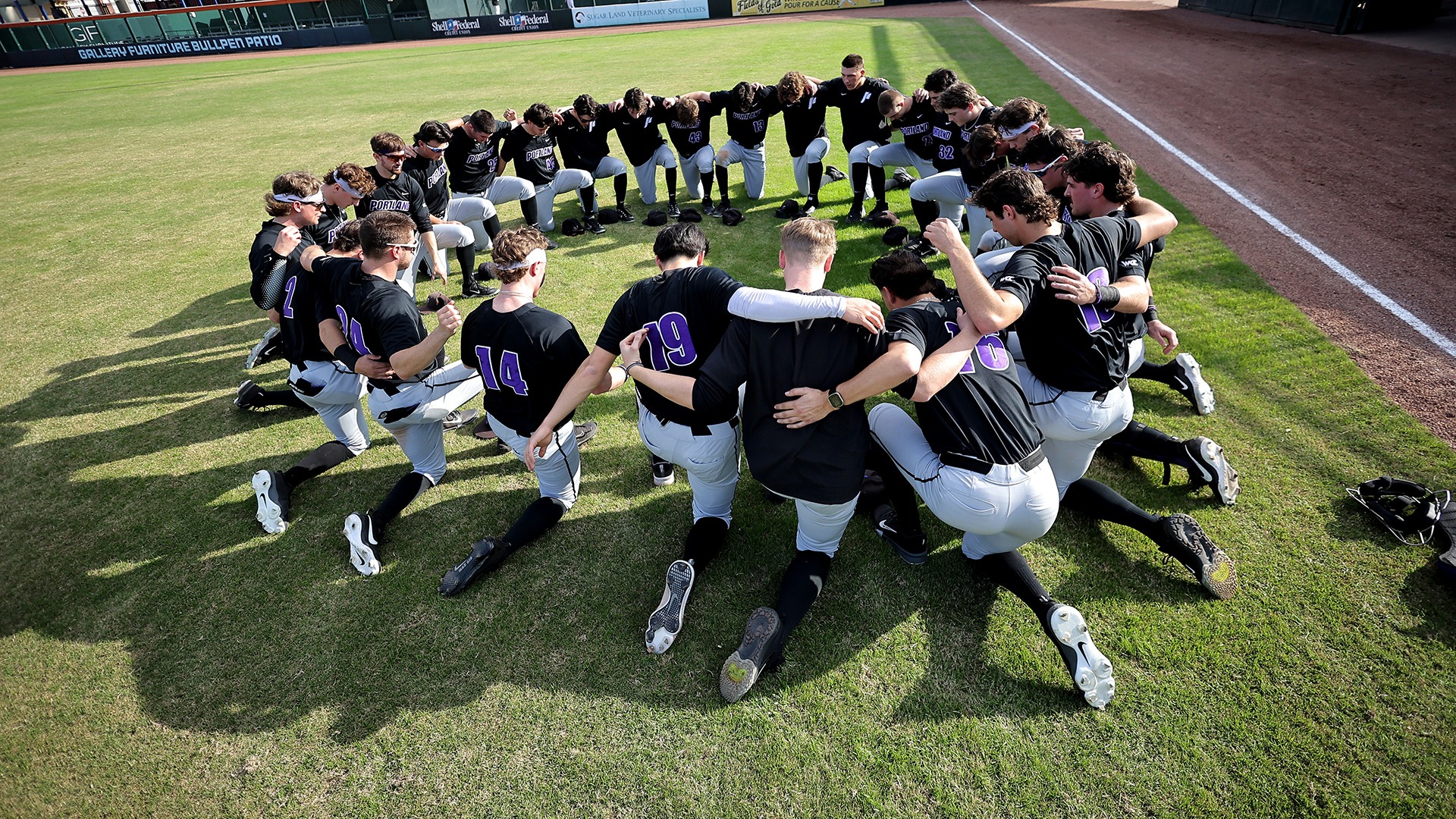 The Pilots huddle around pregame against Purdue.