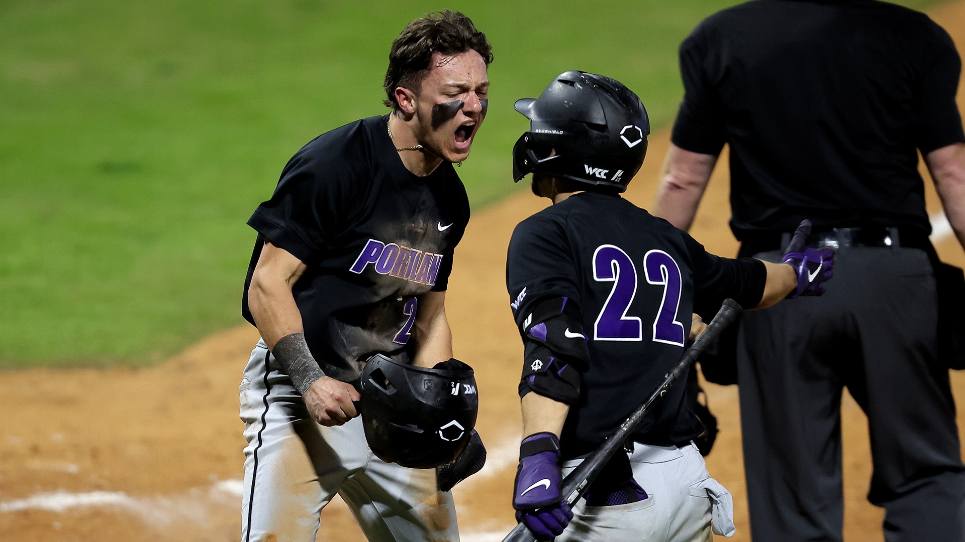 Cody Nitowitz screams with joy after scoring a run.