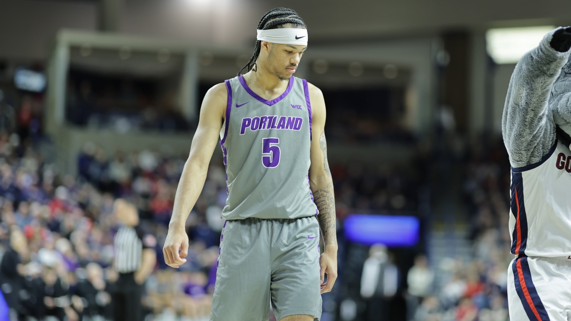 Dante Censori-Hercules on the court in a road game at Gonzaga.