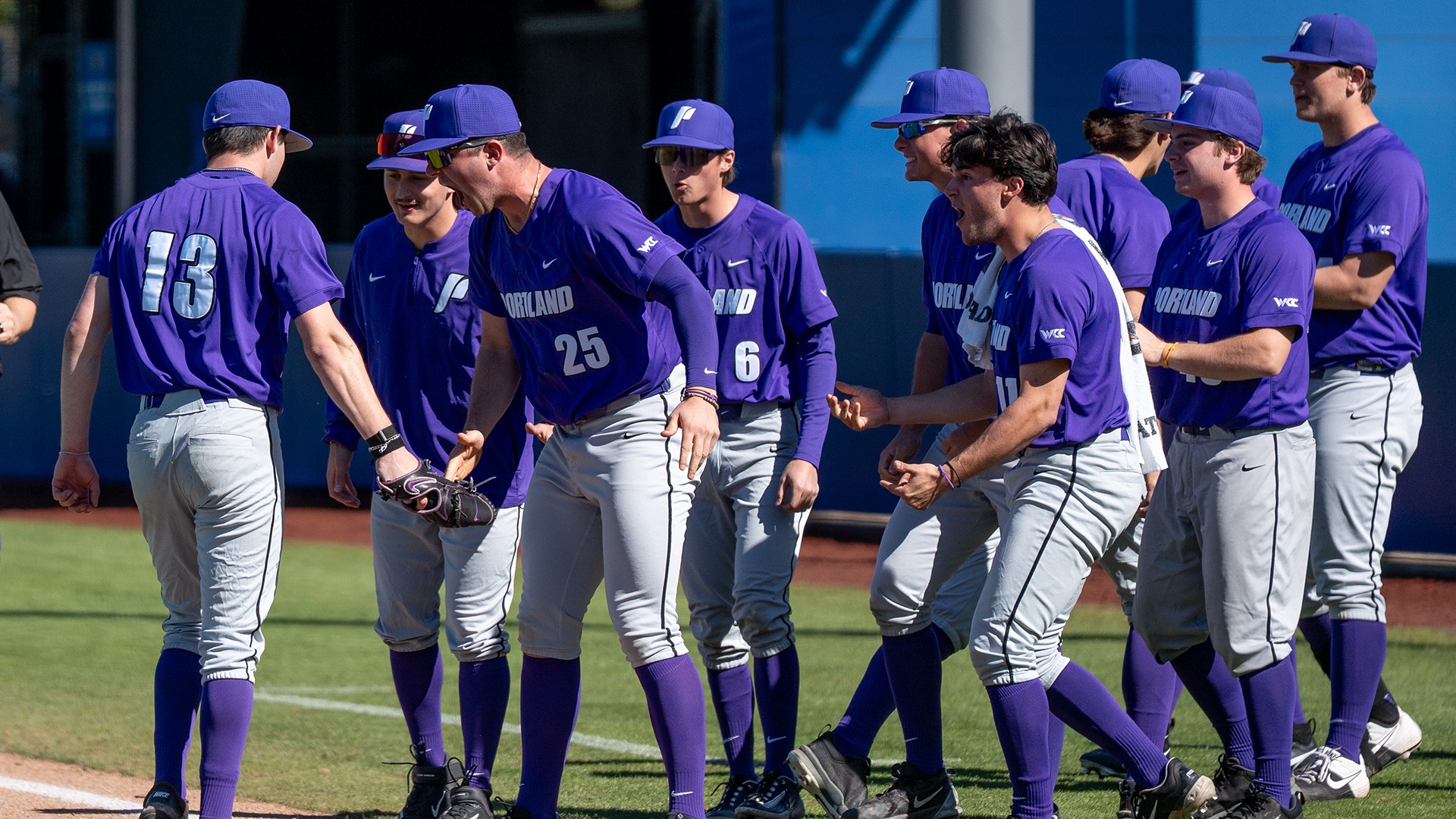 The Pilots celebrate a great inning from Aaron Louis.