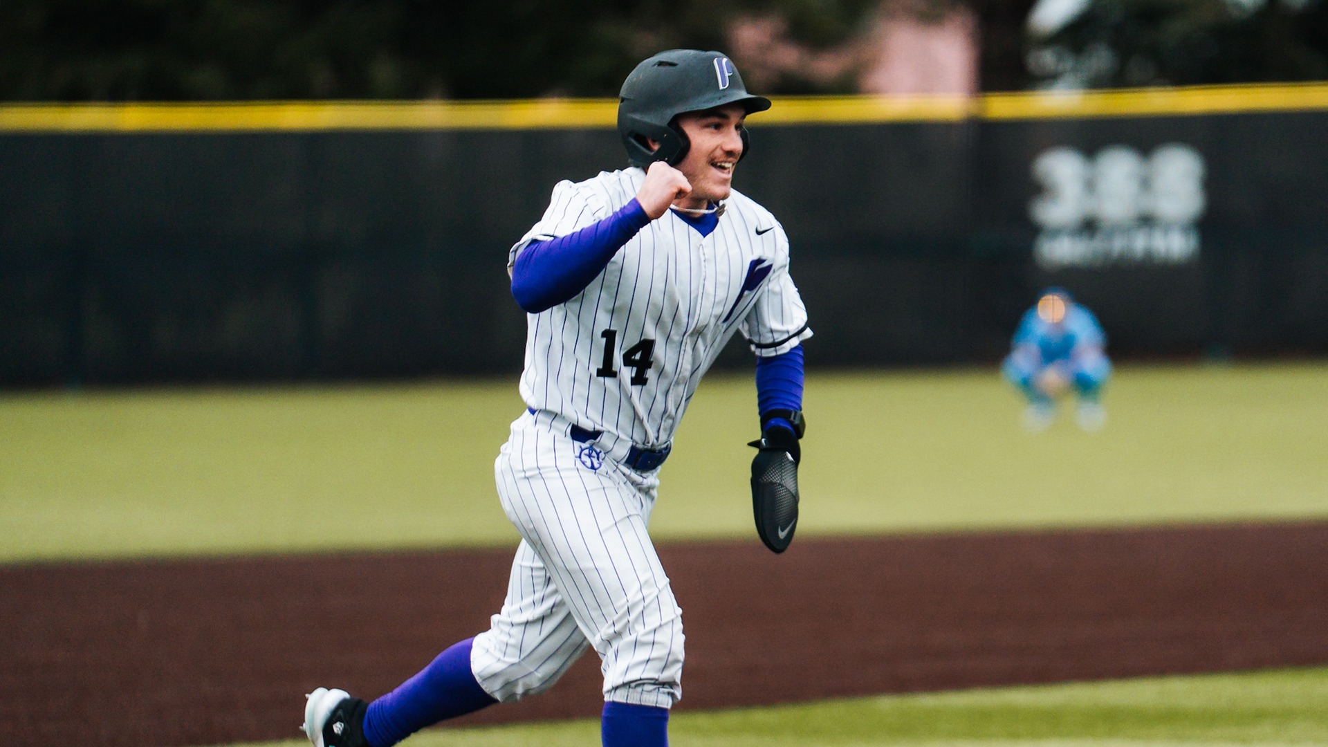 Jonas Salk rounds the bases after a home run.