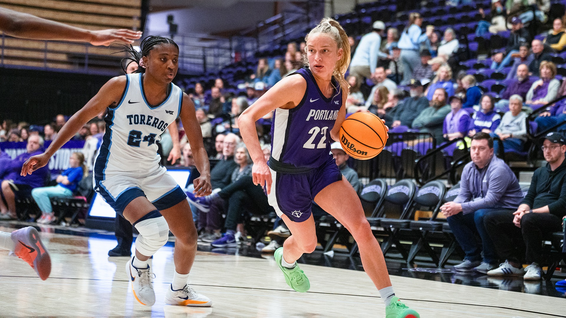Rhyan Mogel looks to drive past a San Diego defender.