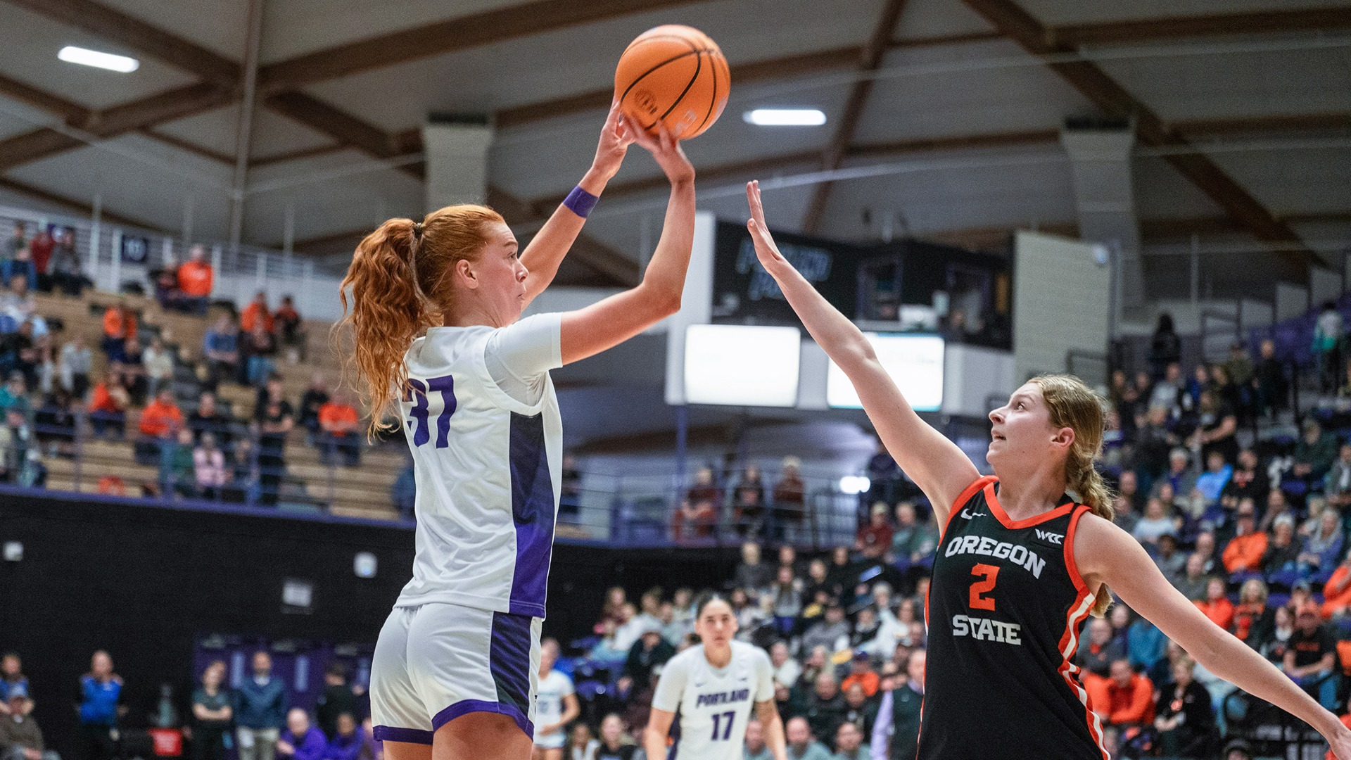 Florence Dallow rises for the jump shot over an OSU defender.