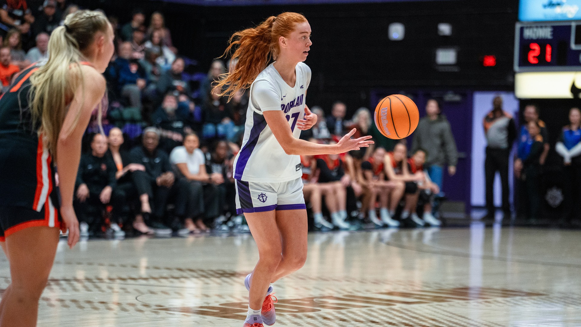 Florence Dallow scoops the pass against Oregon State.