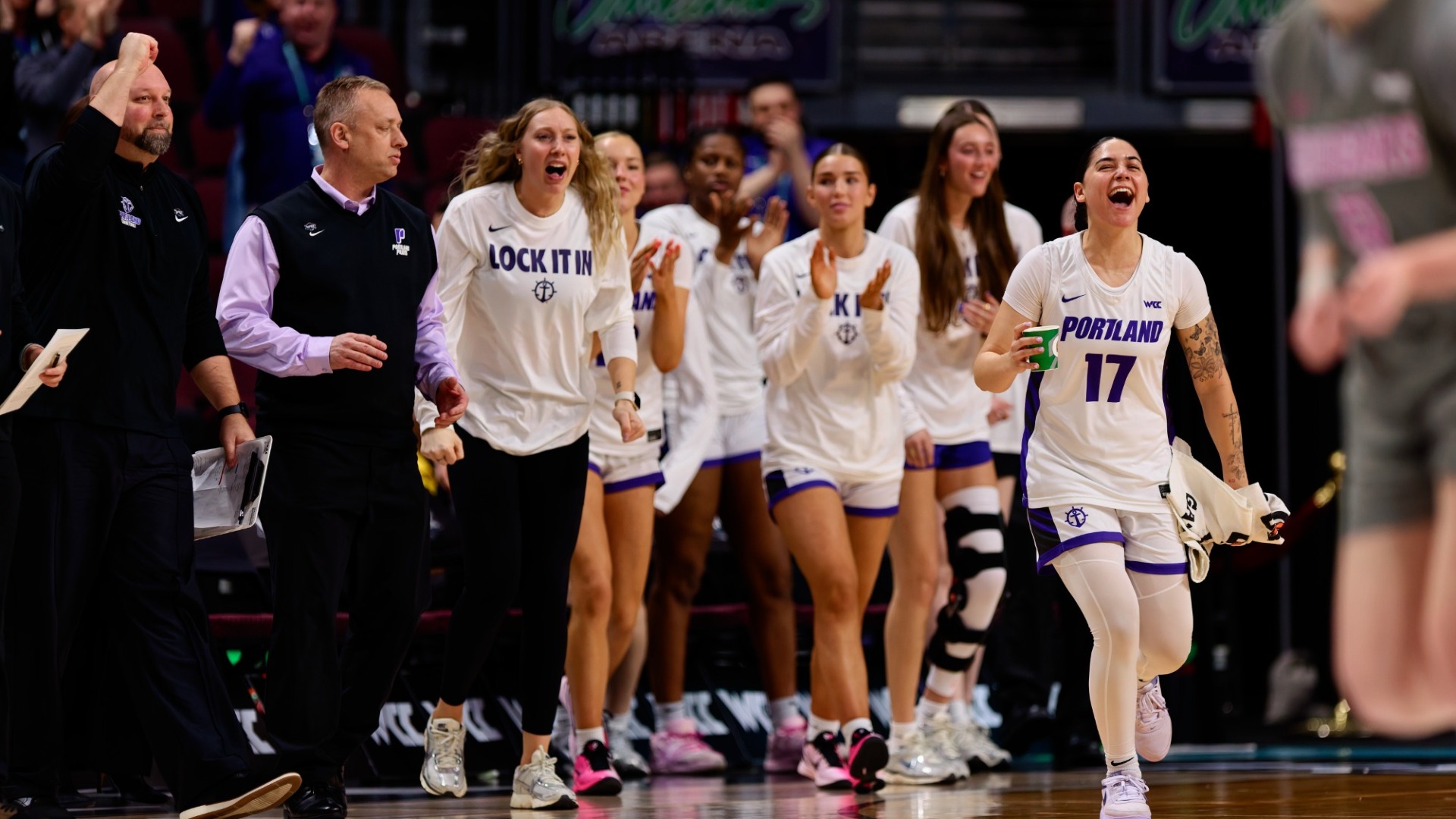 The Pilots bench celebrates a big play against the Cougars.