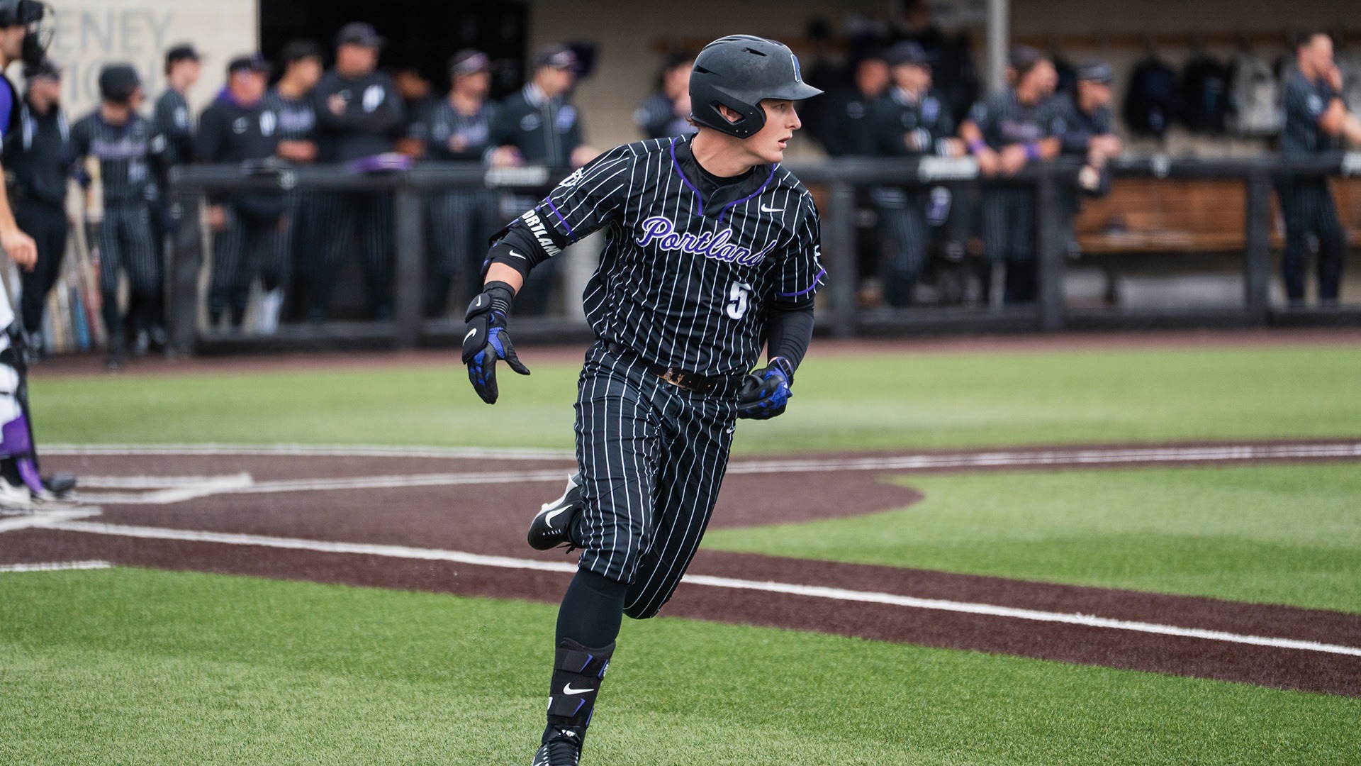 Nolan Miller looks to round the bases against Niagara.