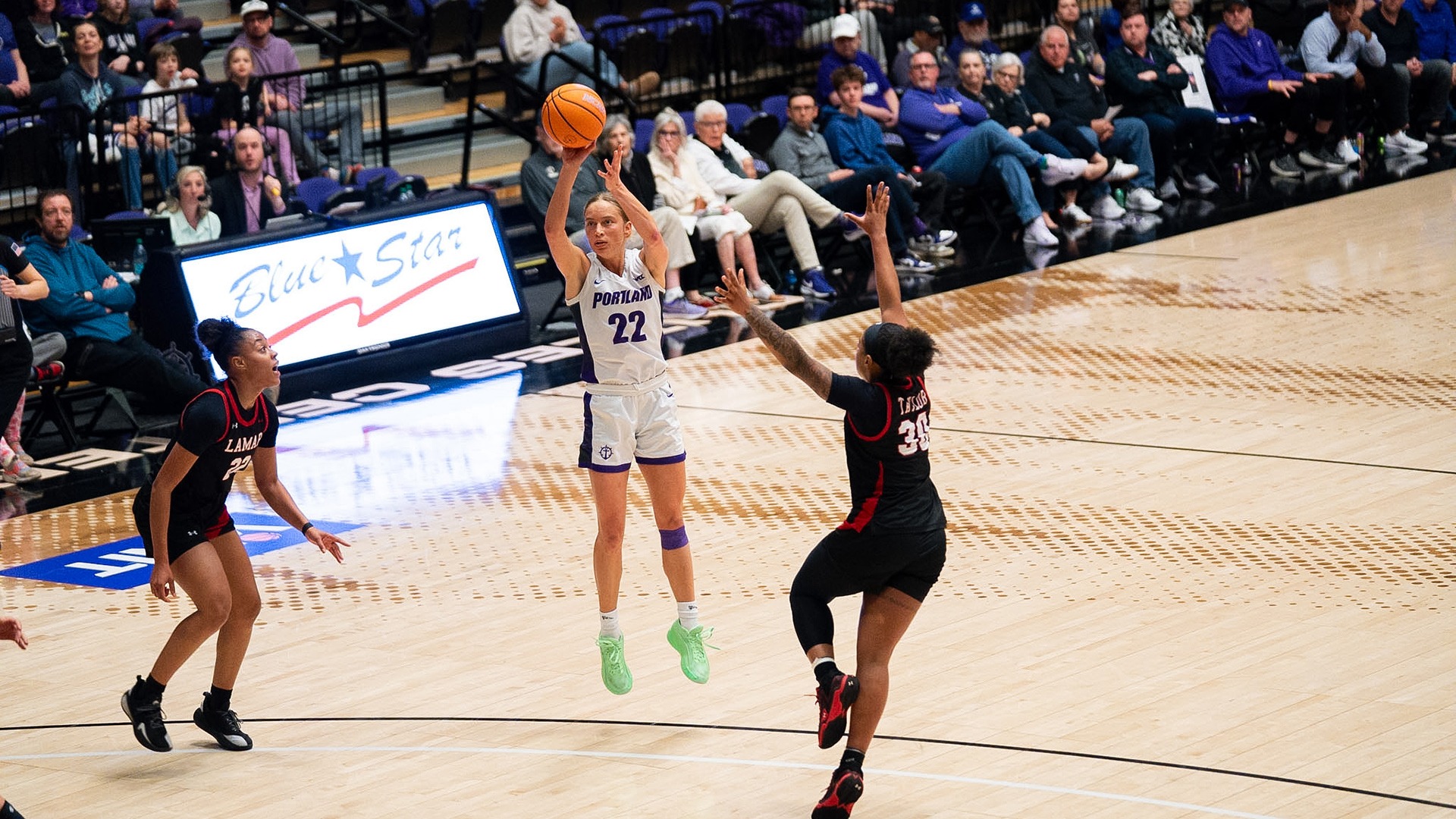Rhyan Mogel drains the jumper over the Lamar defender.