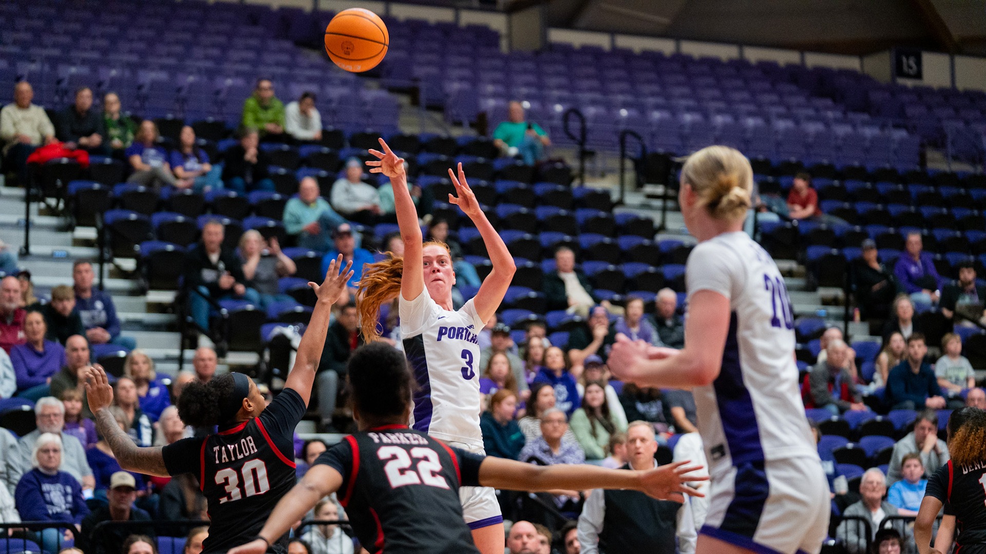 Florence Dallow shoots the jumper over a Lamar defender.