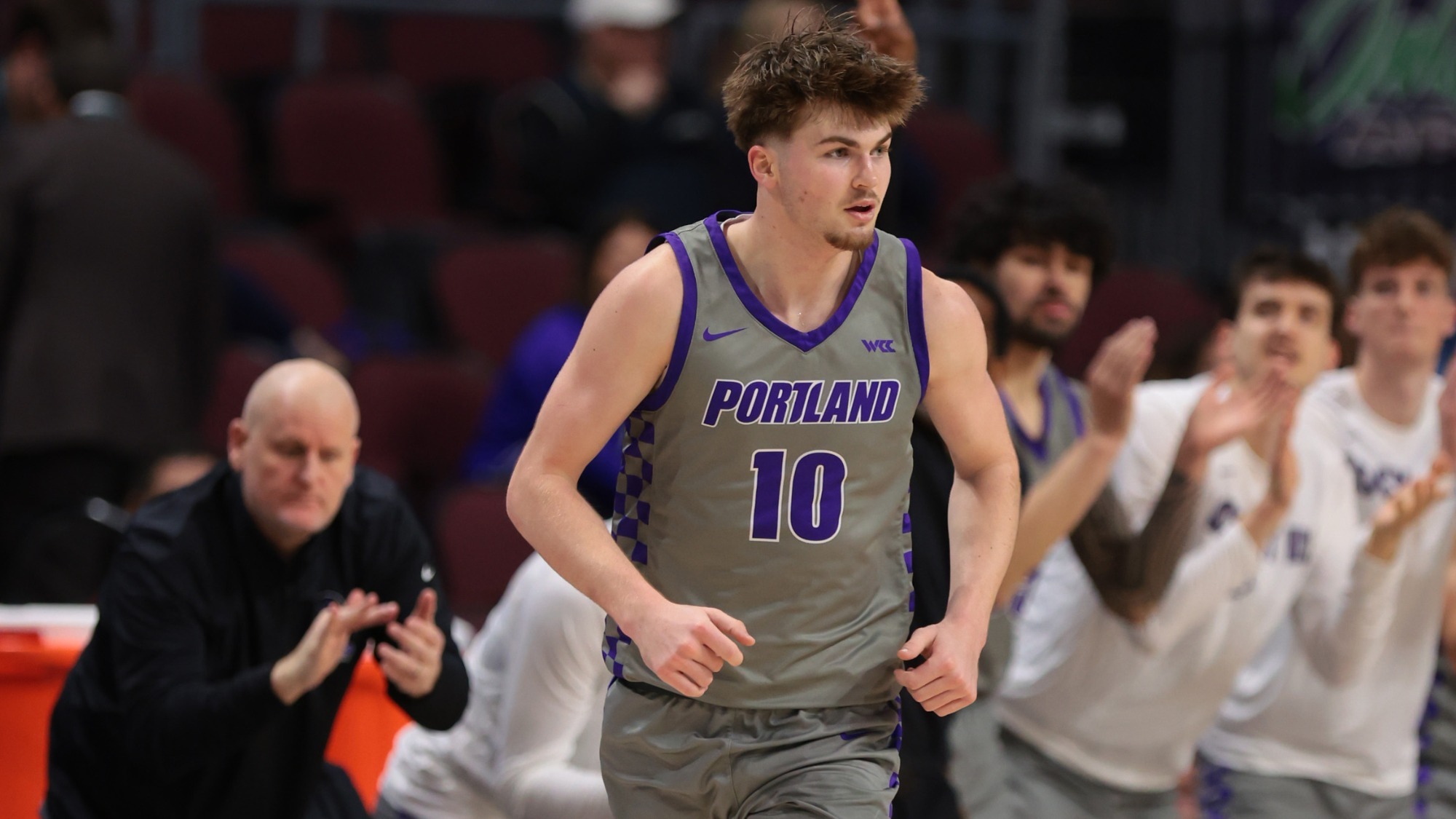 Garrett Nuckolls runs back on defense after scoring against Washington State at the 2026 WCC Tournament in Las Vegas.