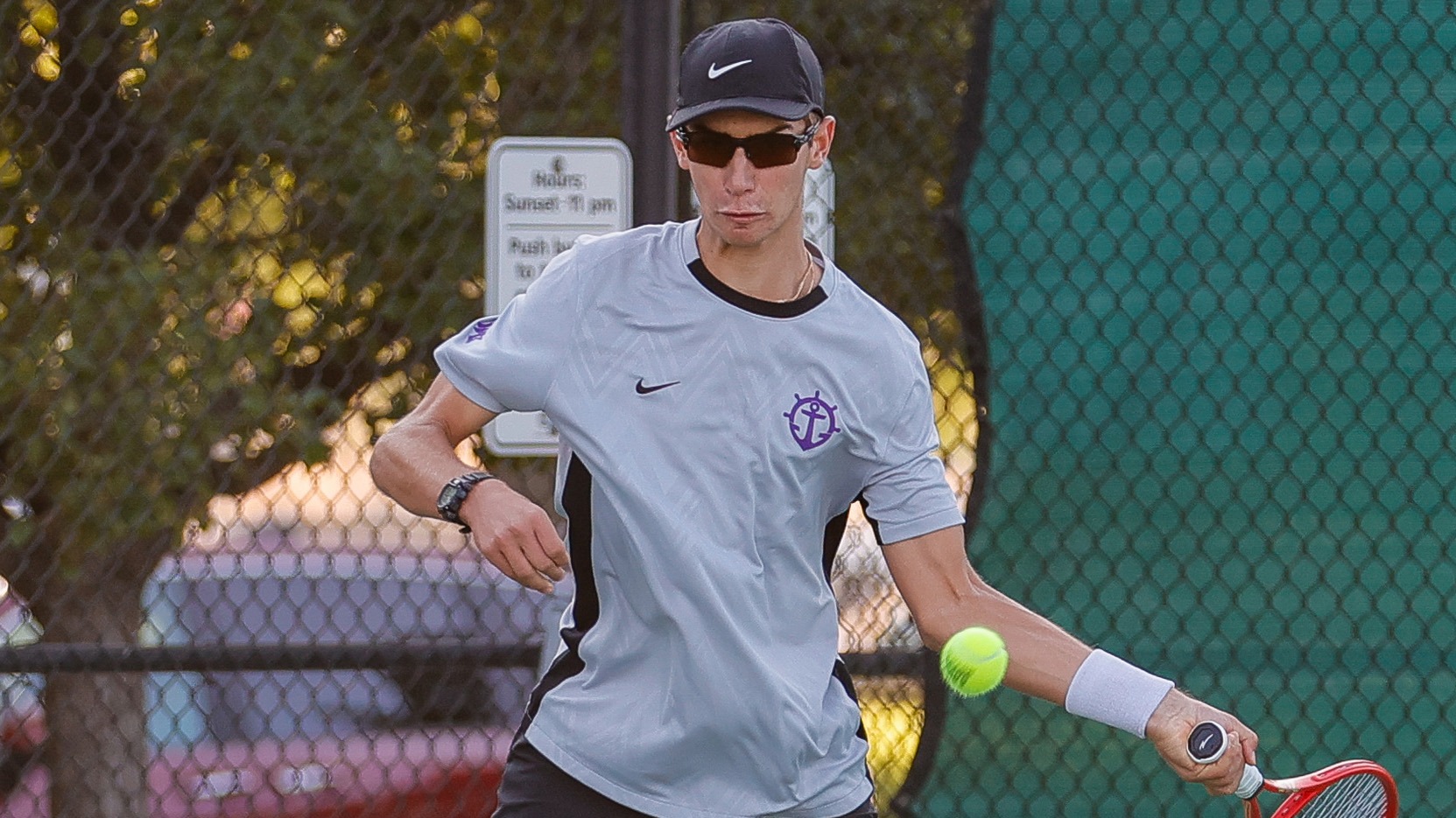 Eli Noel hits a forehand.