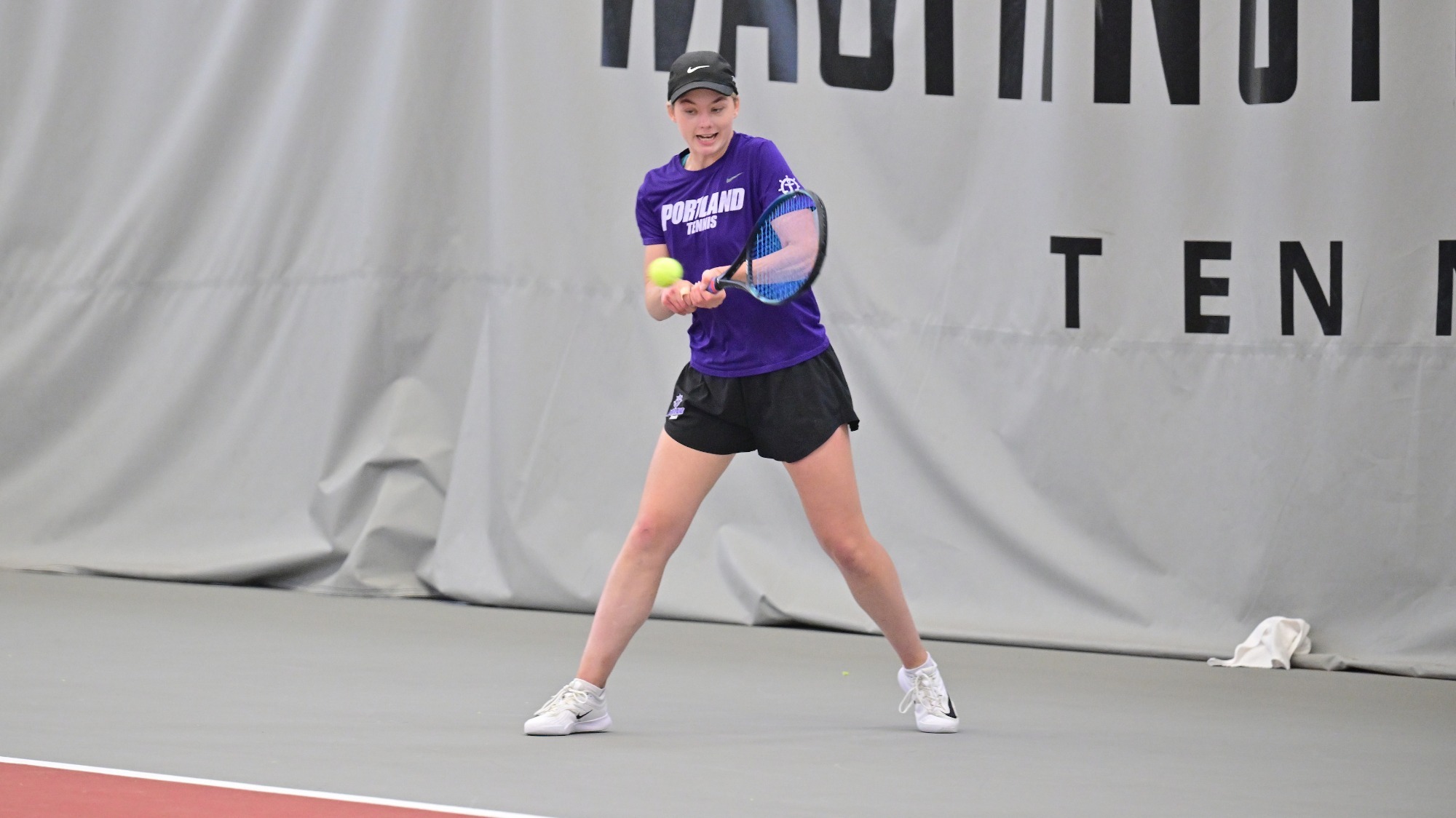 Meagan Pearson hits a backhand during a road match at Washington State.