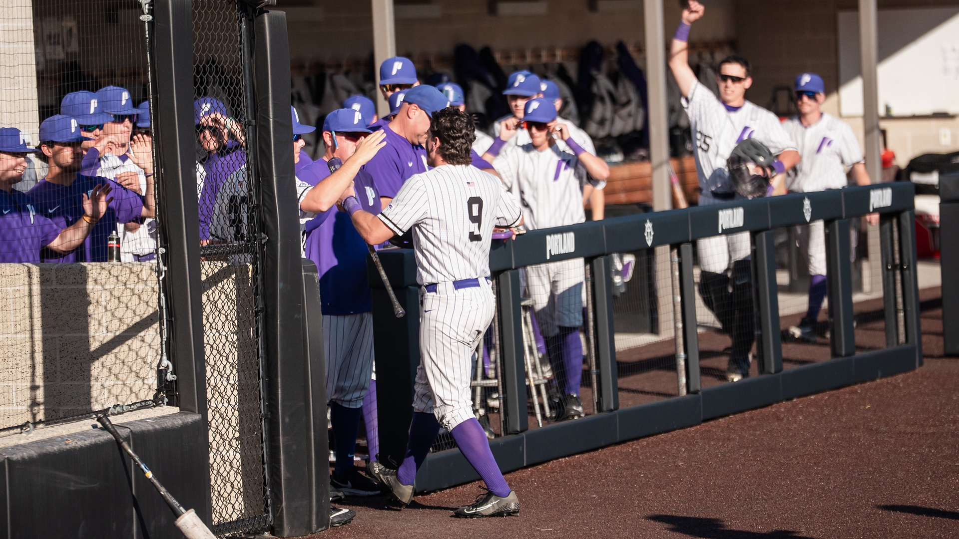 Isaac Pfeifer returns to the dugout.