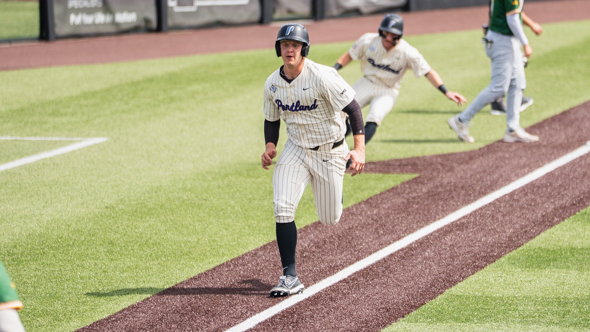 Trey Swygart makes his way home against USF.