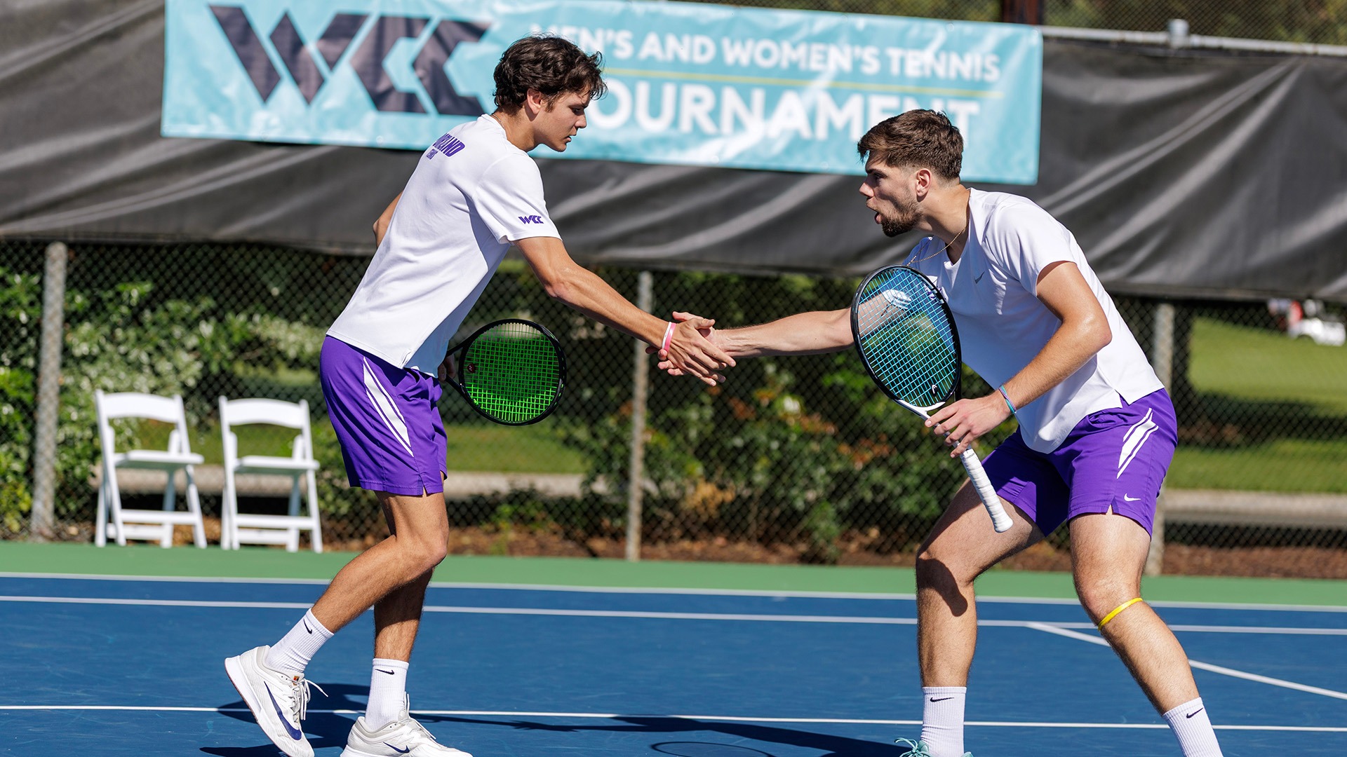 Nikola Keremedchiev and Cade Fernando celebrate a doubles point at the 2026 WCC Tournament