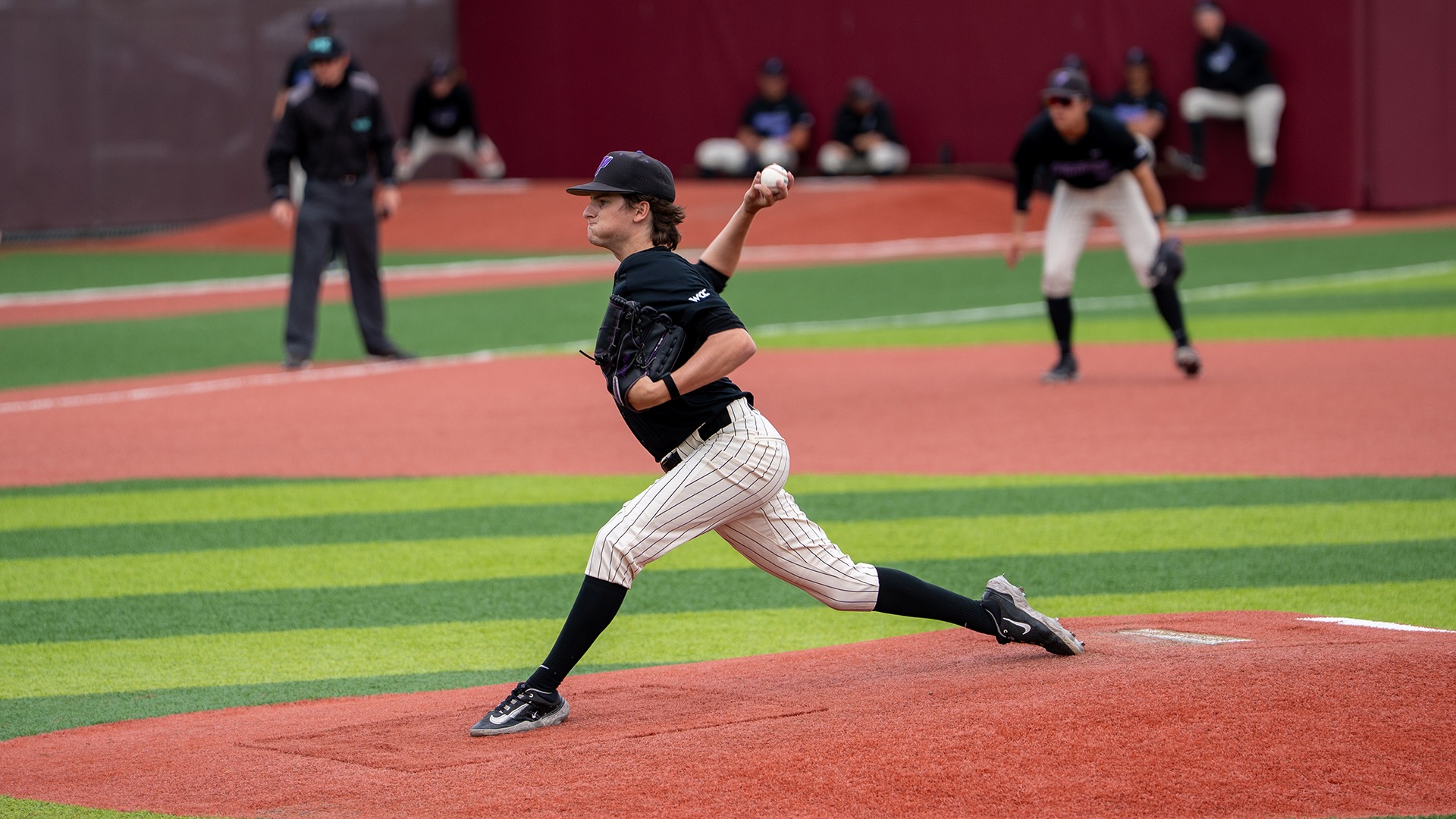 Alex Via throws a pitch against Santa Clara.