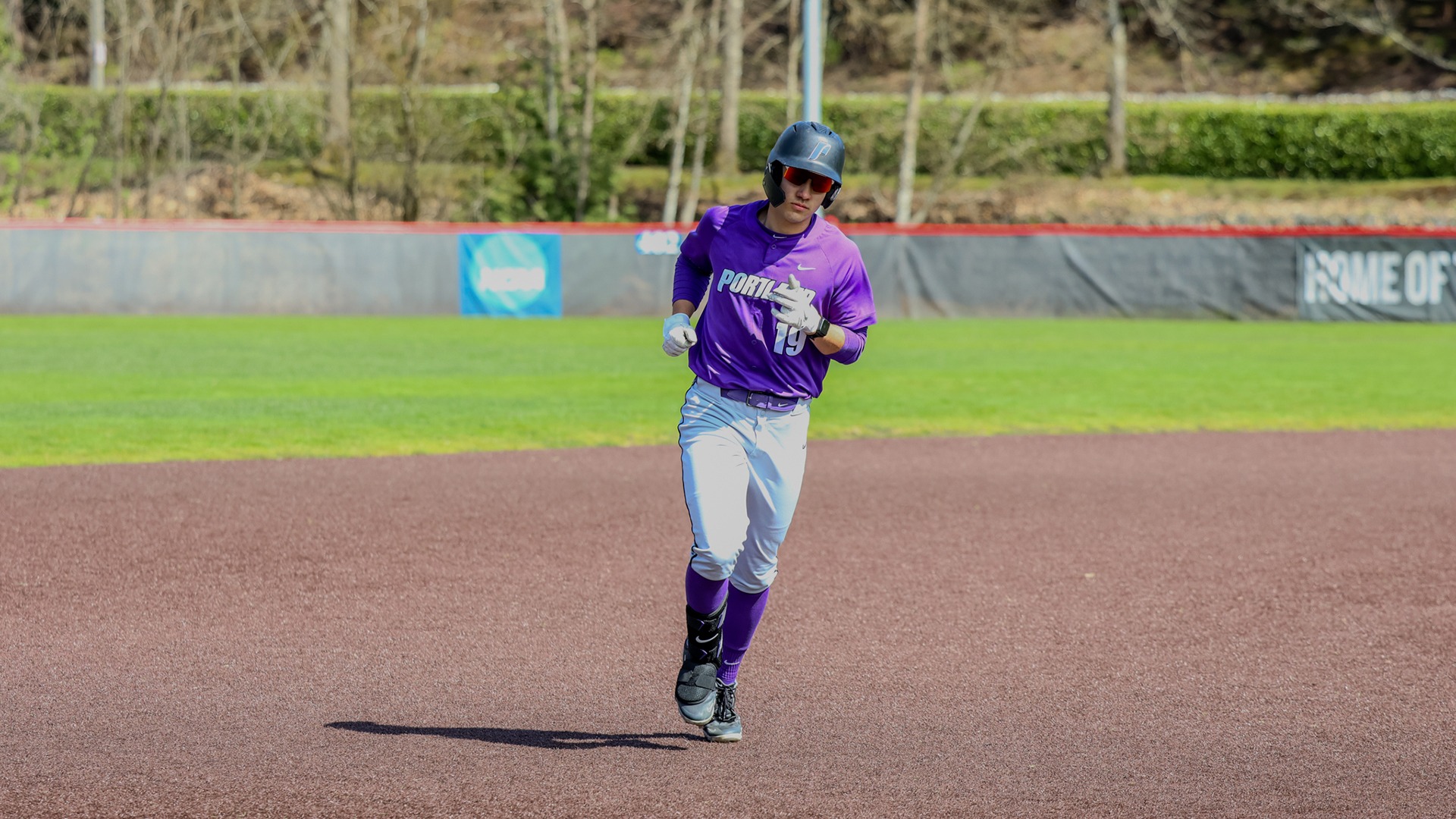 Cole Katayama-Stall rounds the bases after his home run against Seattle U.