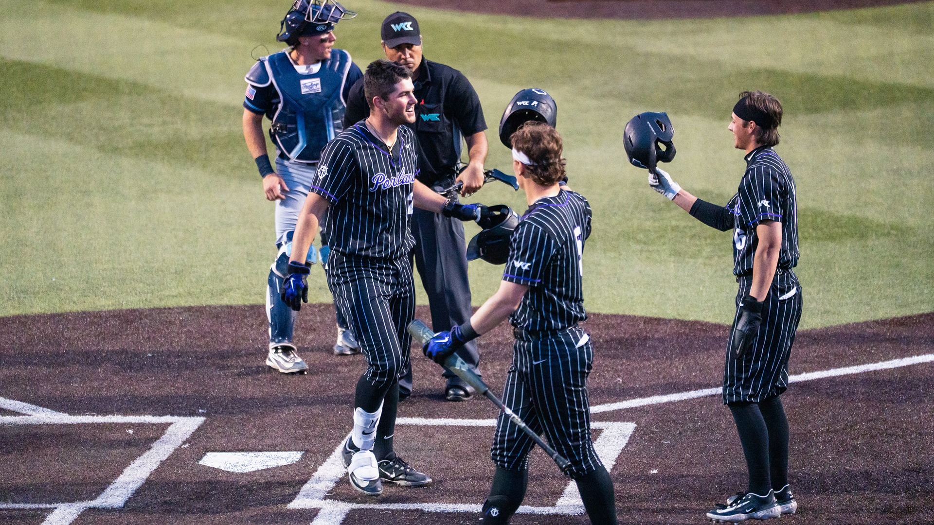 Leo Cote celebrates his home run.