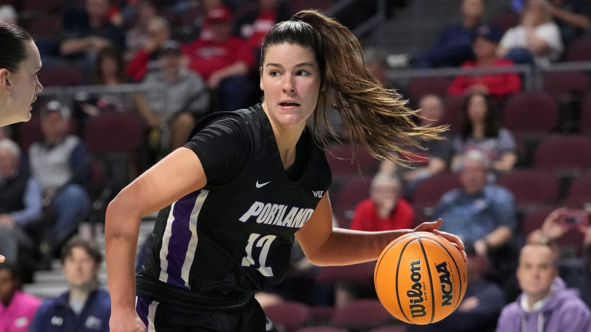 Alex Fowler drives to the basket during the 2023 WCC Tournament