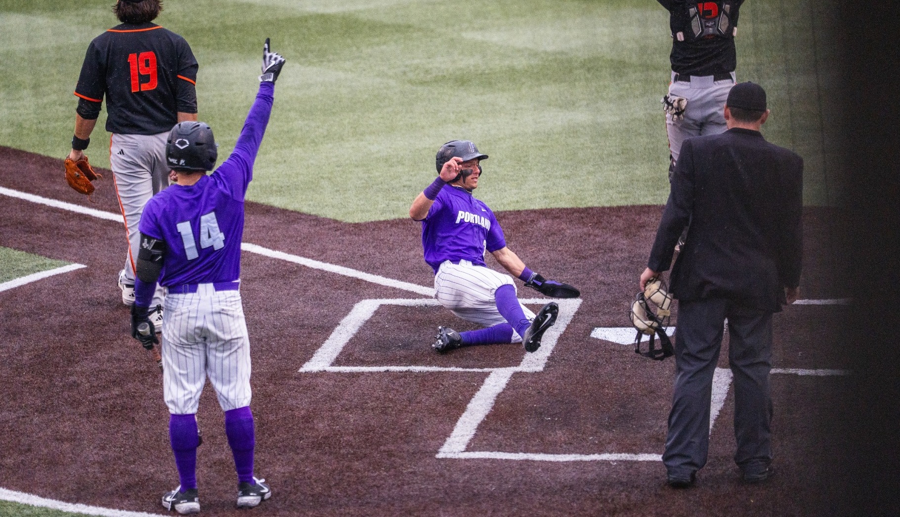 Cody Nitowitz slides home to score the first run against Pacific in Portland's 3-2 win over the Tigers on May 15, 2026.