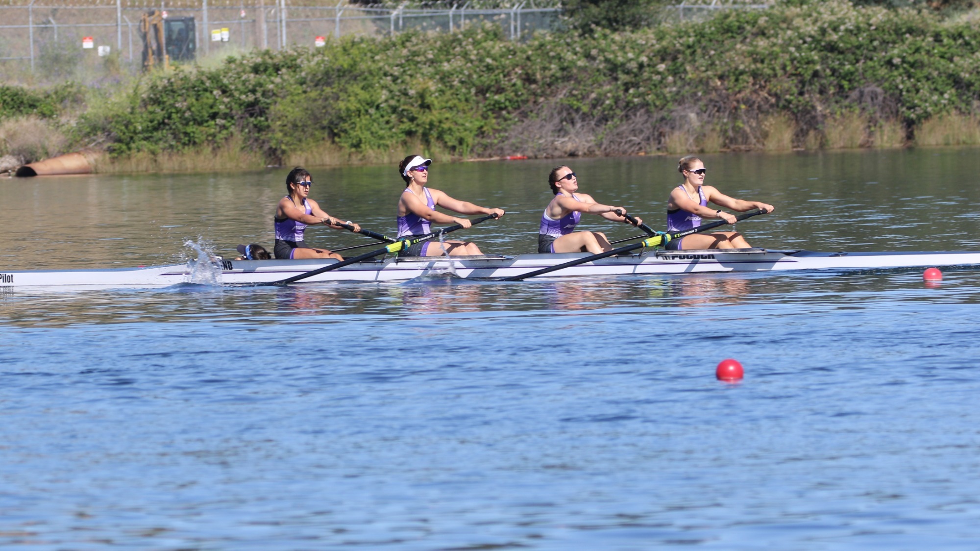 Portland's first varsity four rowing team during a race at the 2026 WCC Championships at Lake Natoma.