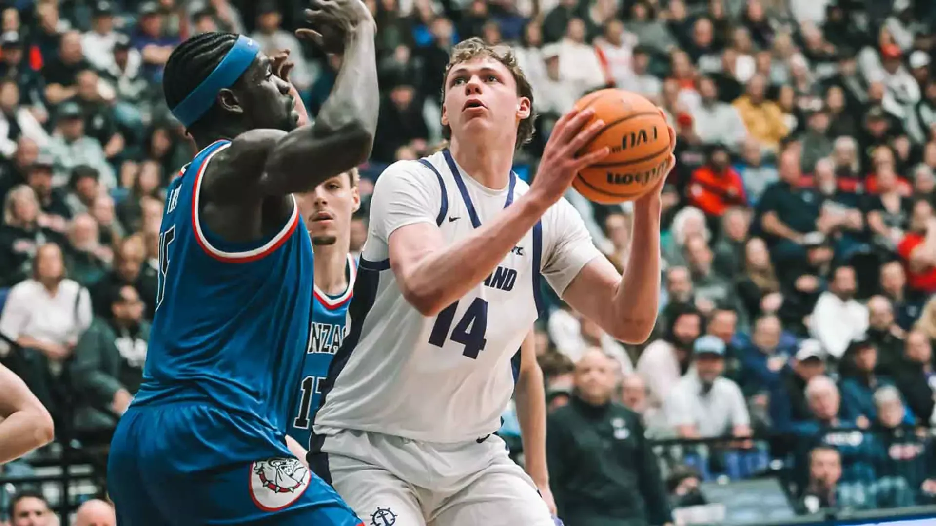 James O'Donnell posts up against the Gonzaga Bulldogs in a home game during the 2025-26 season.