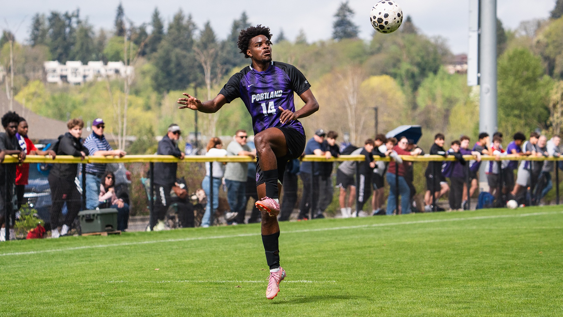 Justin Nelson juggles the ball in a spring game.