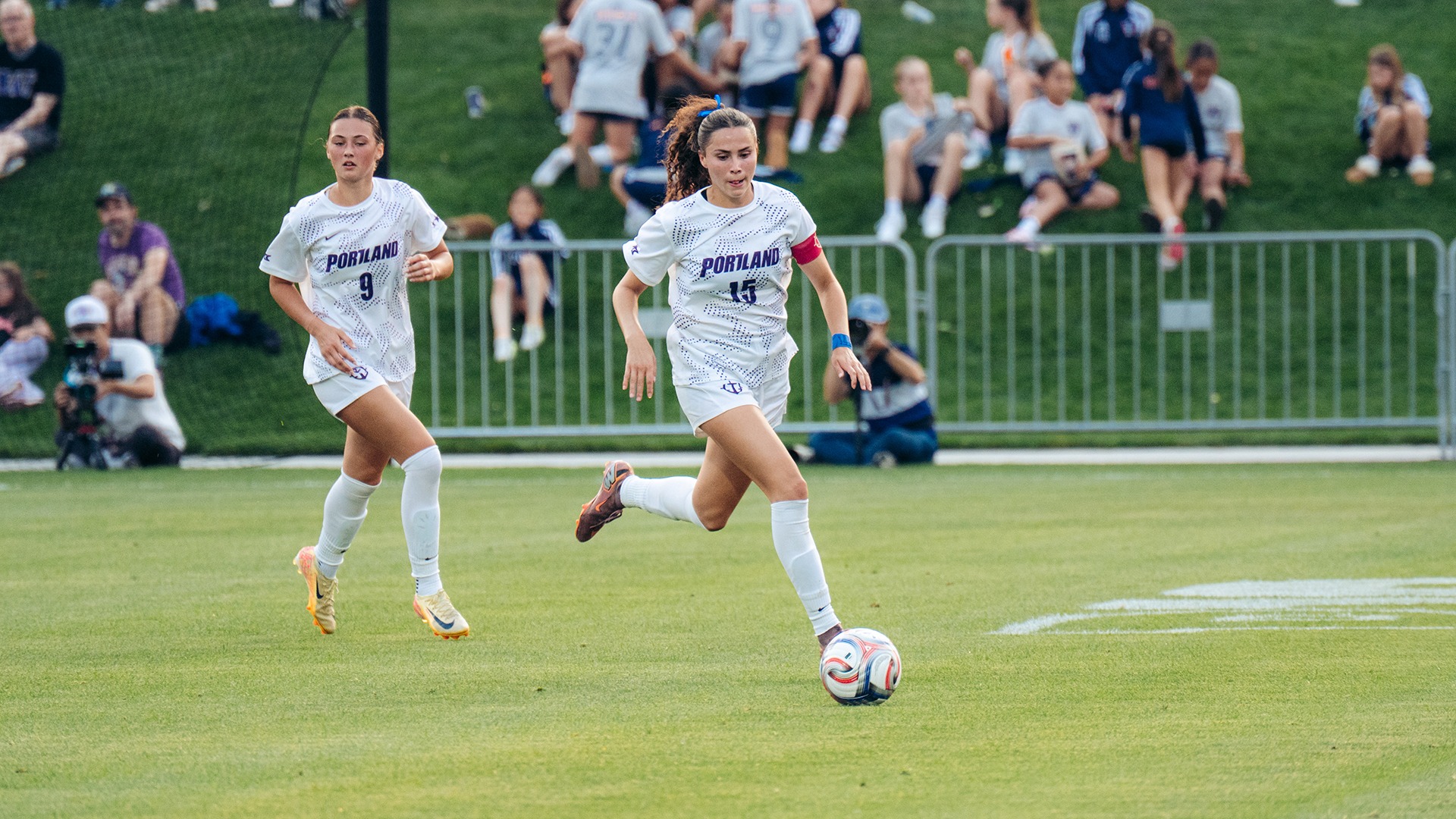 Aliyah Dockter moves the ball downfield for Portland.