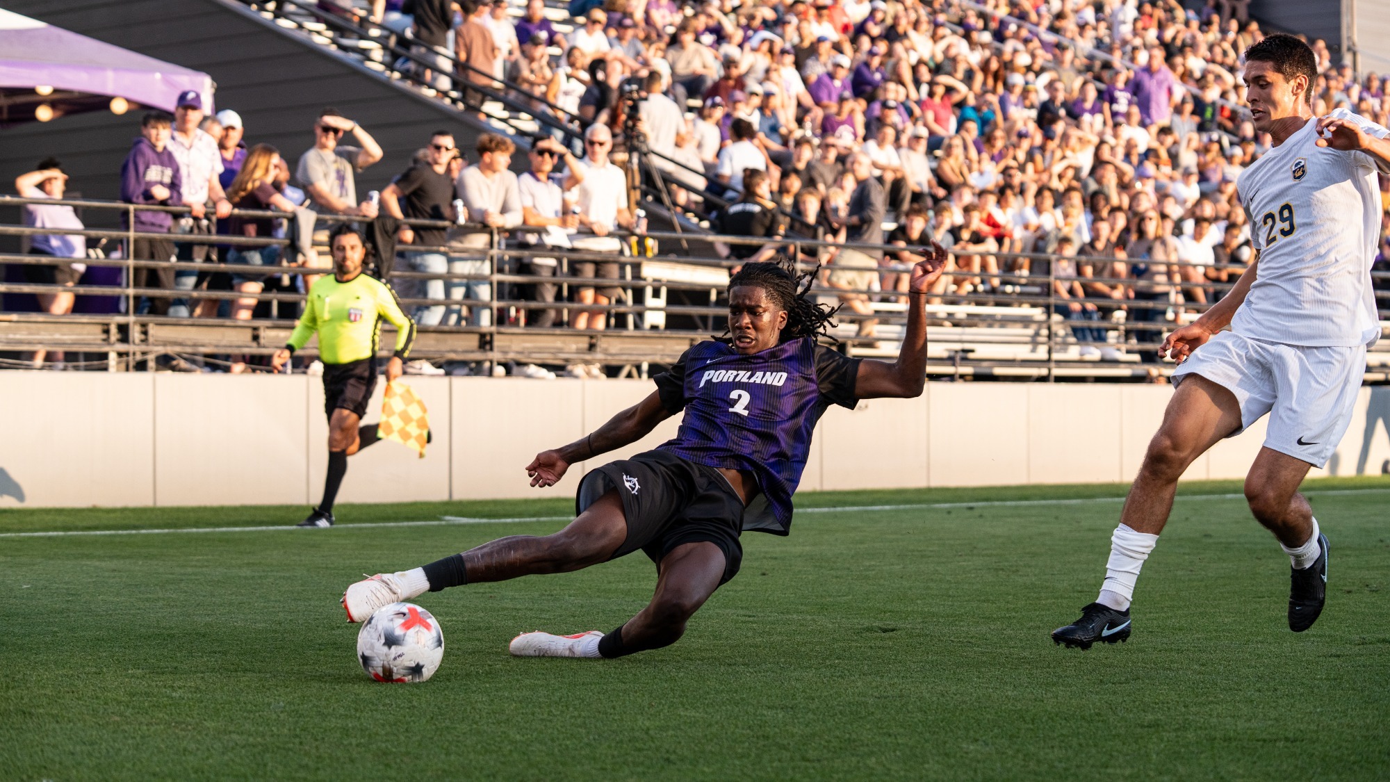 Ayo Akintobi slides into the play against Cal.
