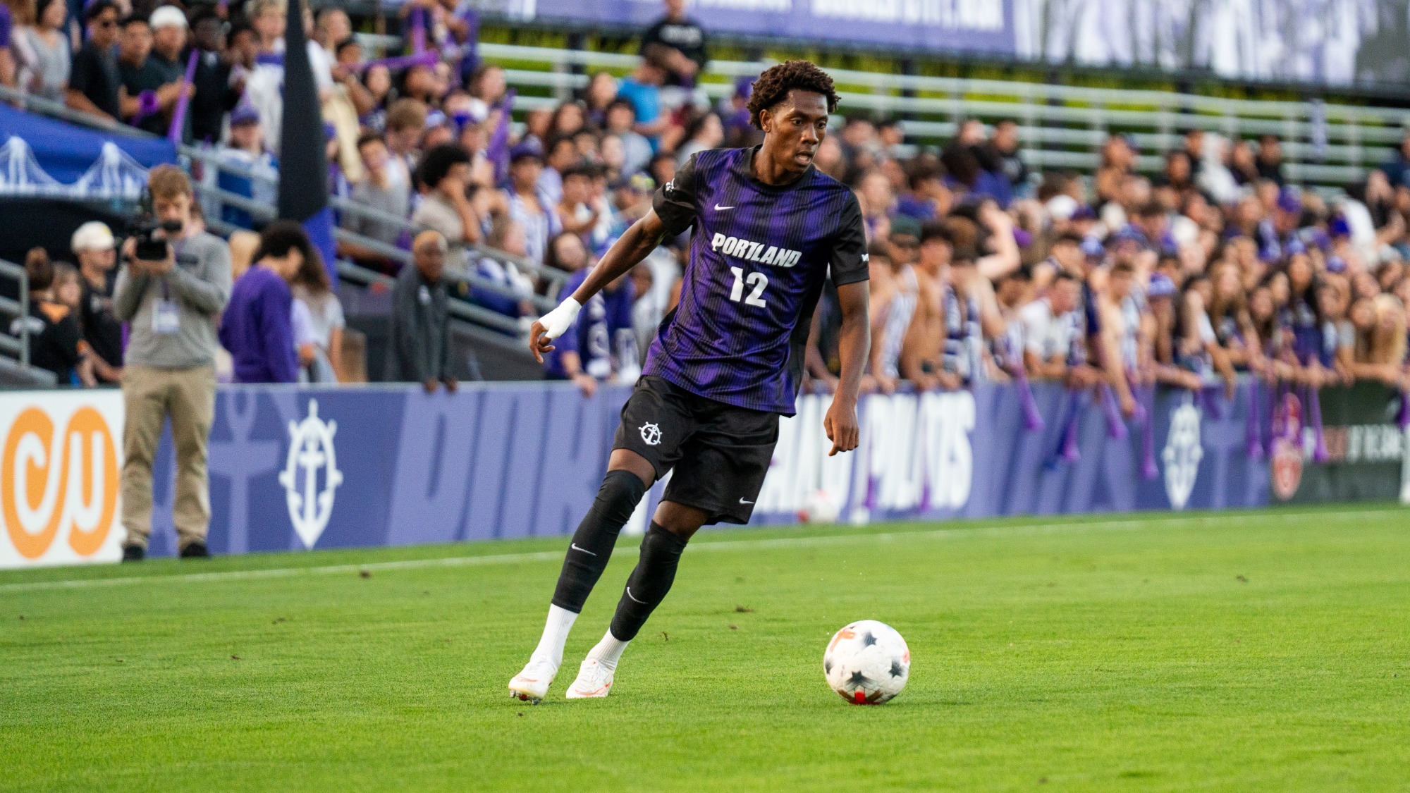 Isaac Emojong searches for a cross.