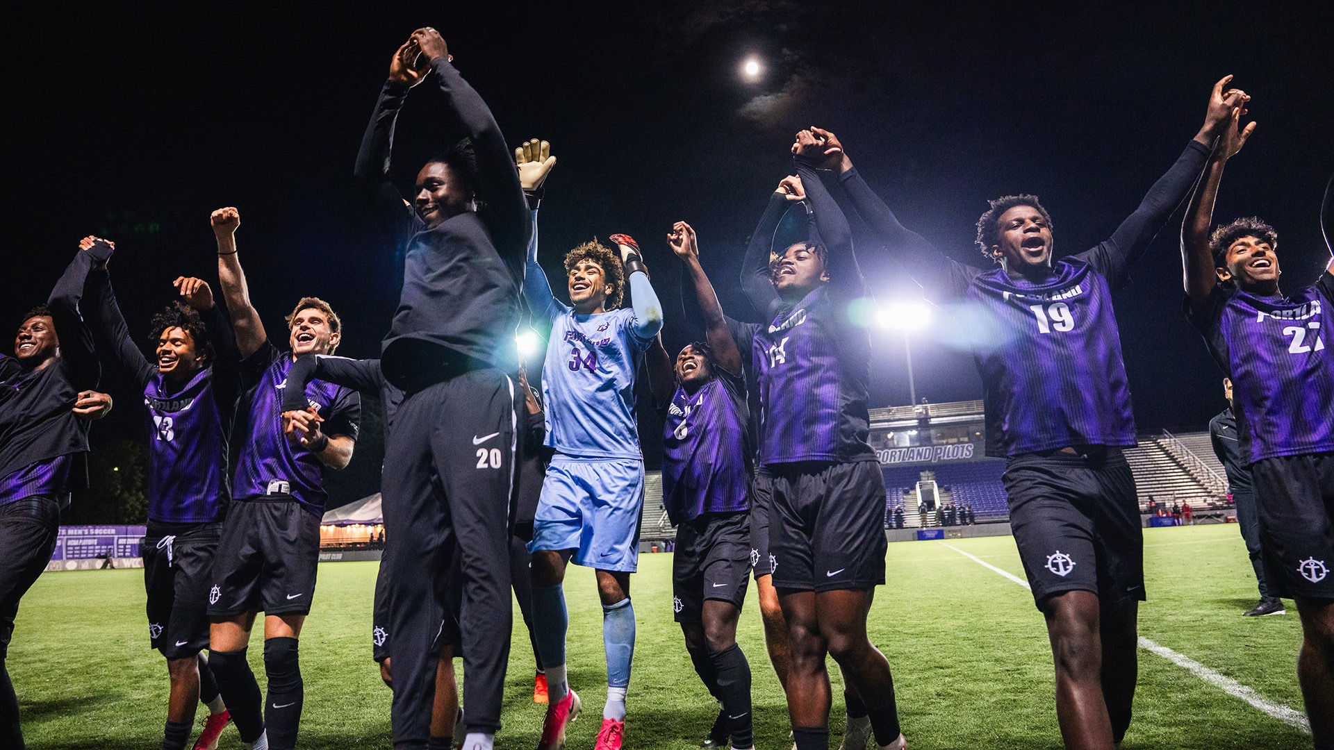The men's soccer team celebrates their 4-0 win over LMU.