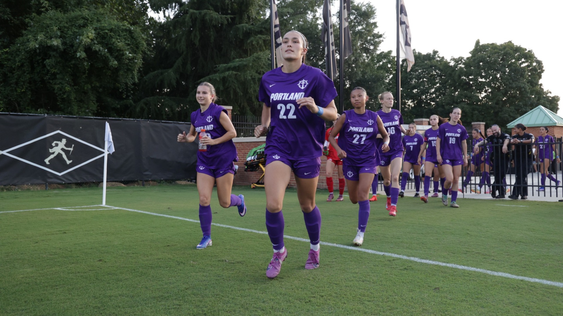 Taylor Norman leads the Pilots out on the field against Wake Forest.