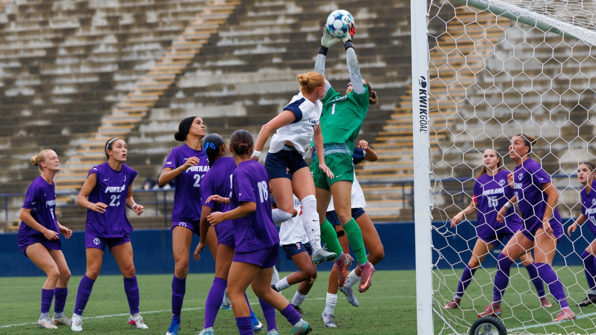 Sophia Hills flies high to grab the ball in goal.