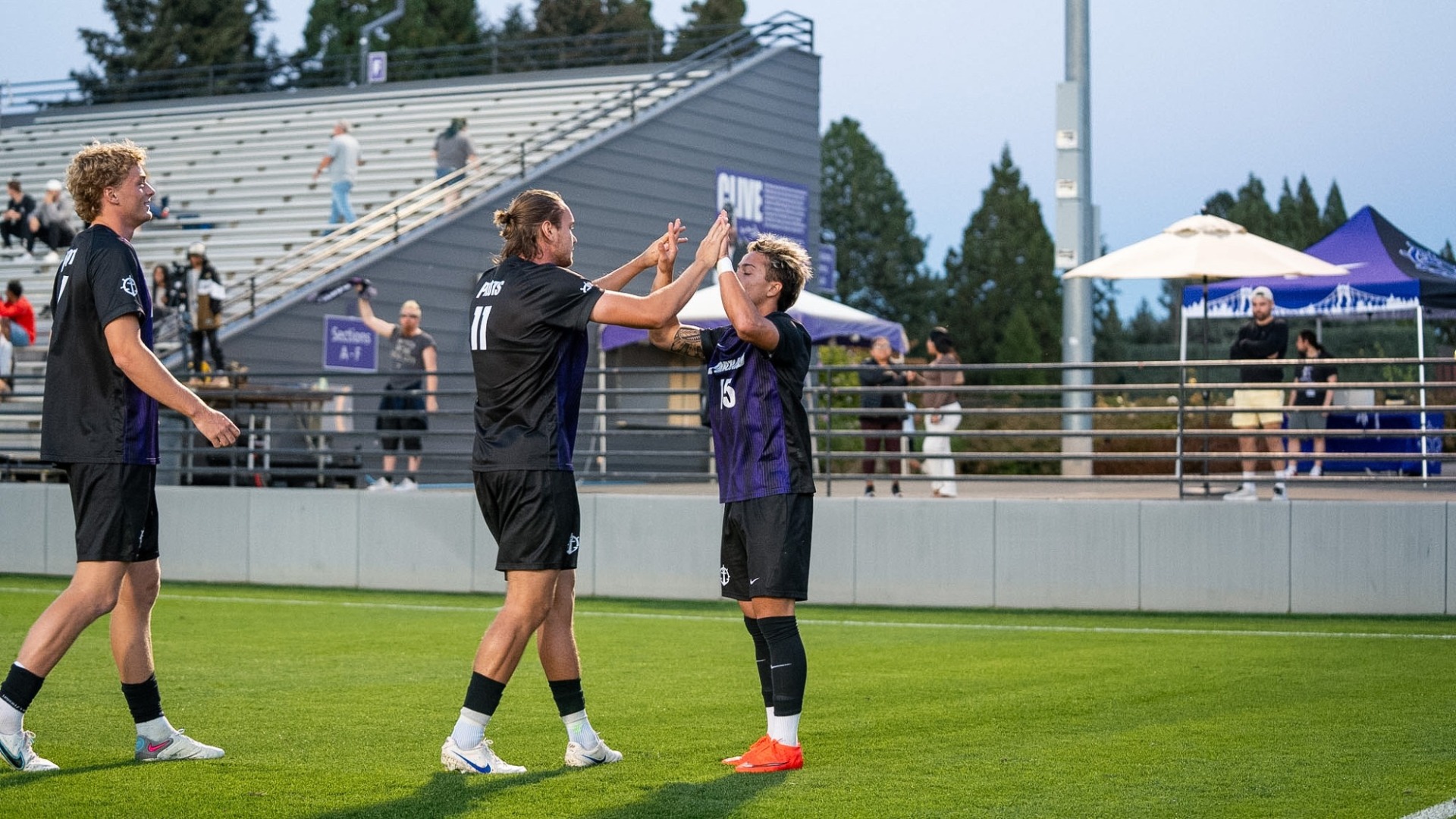Dominic Edwards and Anton Hjalmarsson hi-five after Edwards's goal.