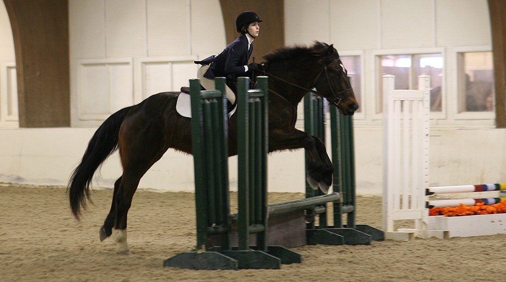 Carlene Benson riding at SLU jumping some obstecles 2012-13.