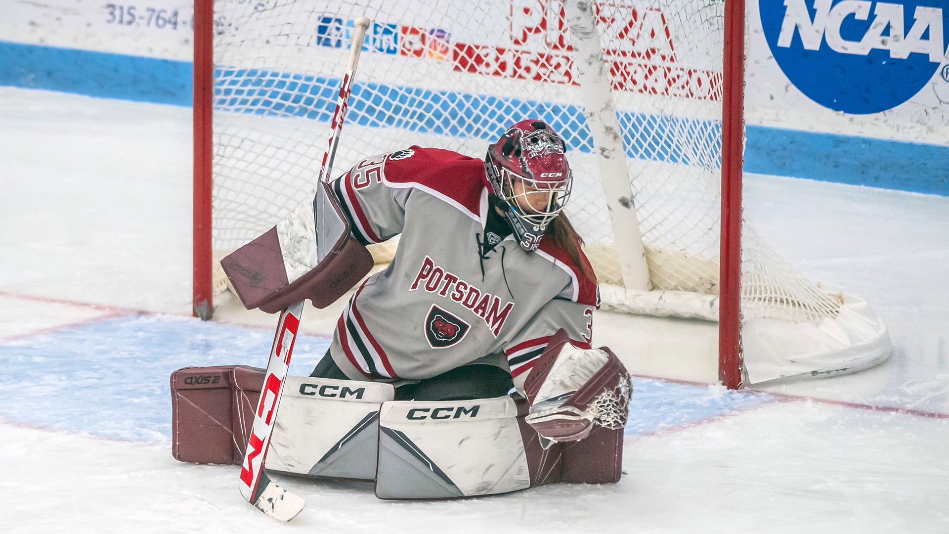 Magalie Parent gloves the Puck against Canton on 11/3/23.
