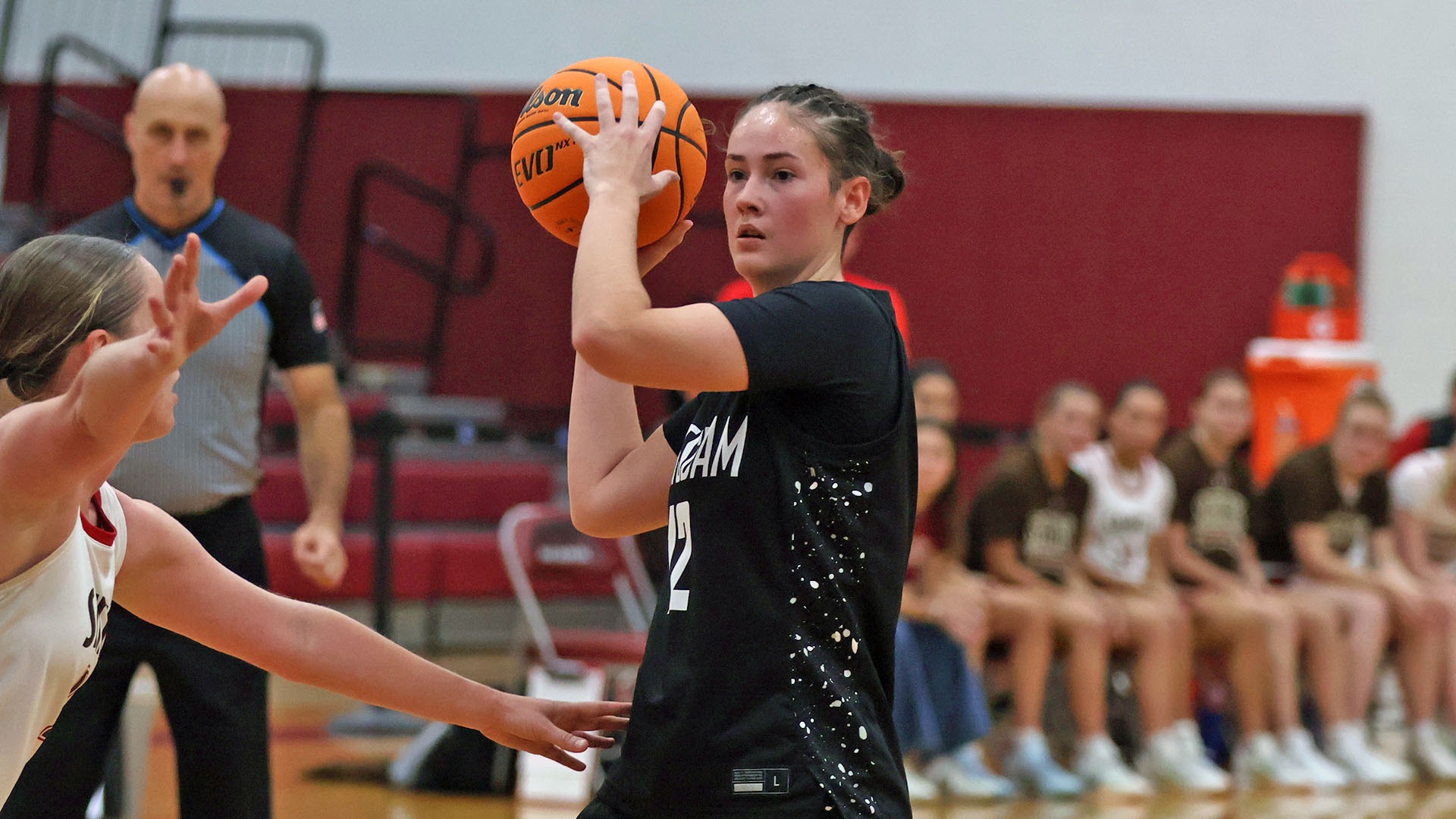 DaeLynn Alcock looks to pass the ball against SLU on 11/8/25.