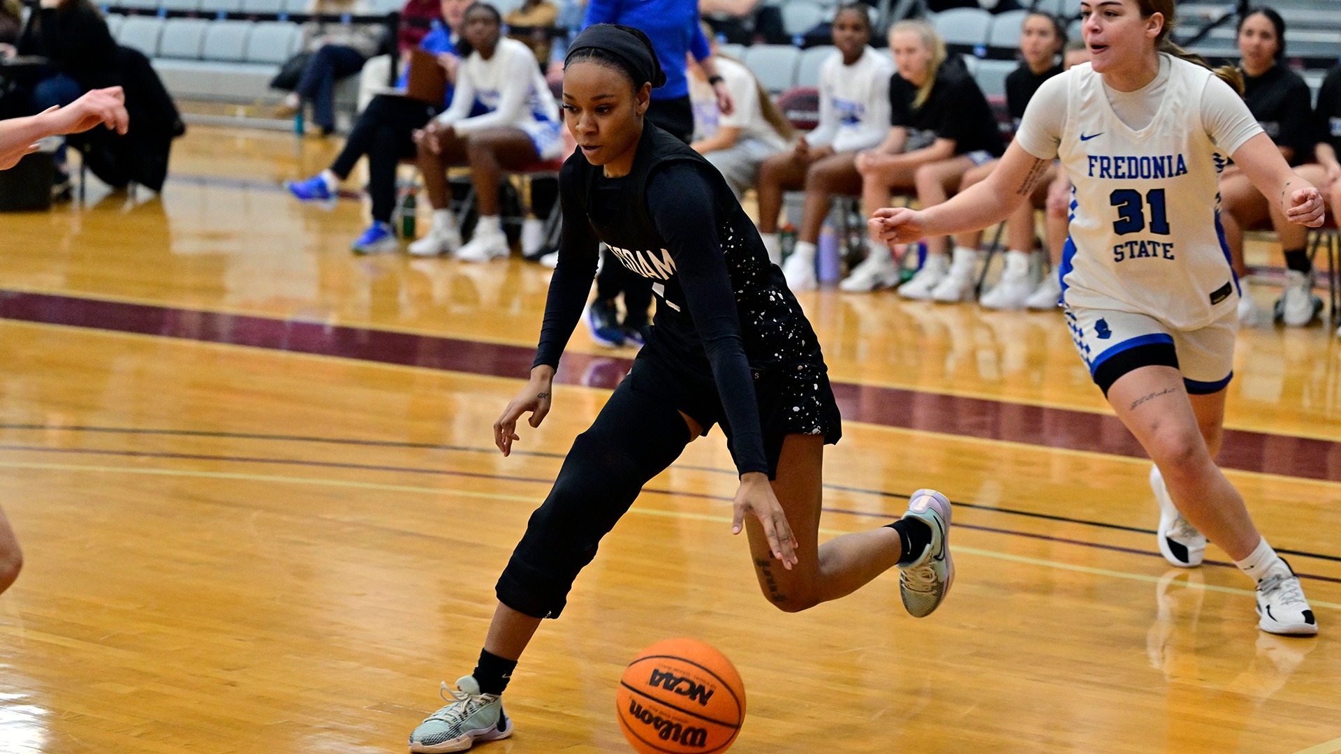 Xy'El Bradford drives to the basket against Fredonia on 12/6/25.